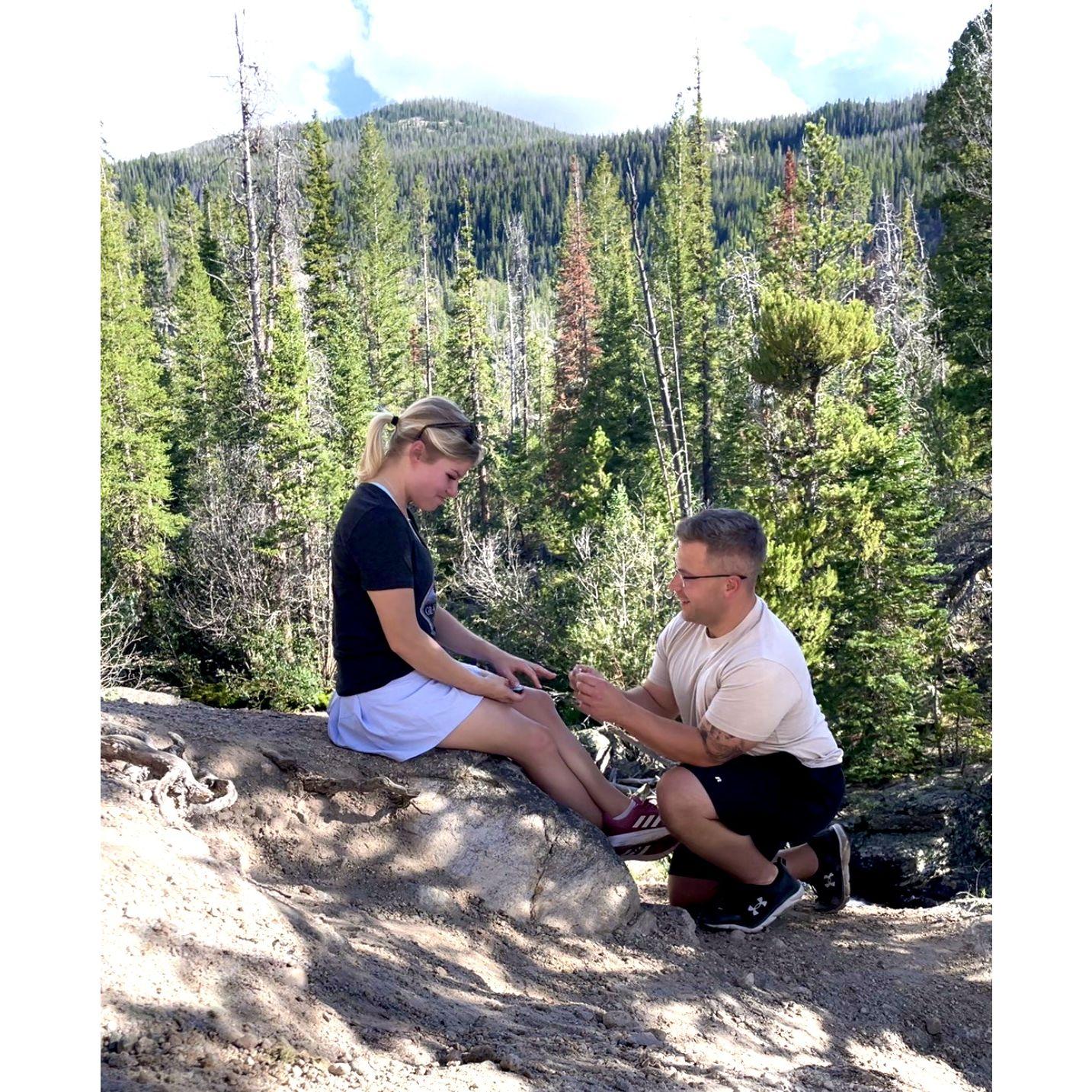 Remember that mint tin? Mikey had staged a moment so that I would reach into his backpack, find the mint tin from a year prior, and open it to find a diamond ring. And then he proposed!