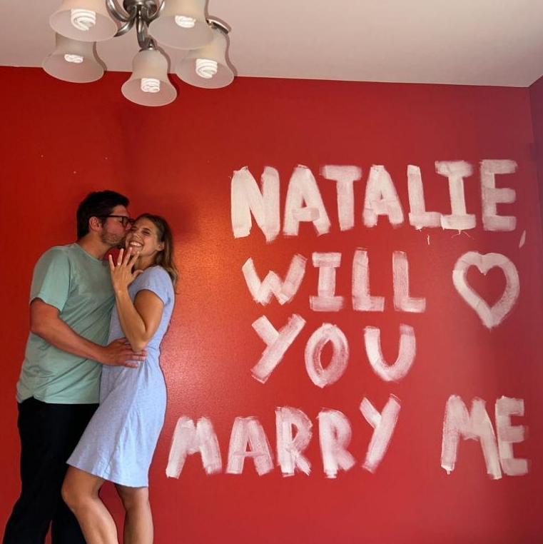 July 2024: Garrett proposed the day before we were painting the red kitchen!