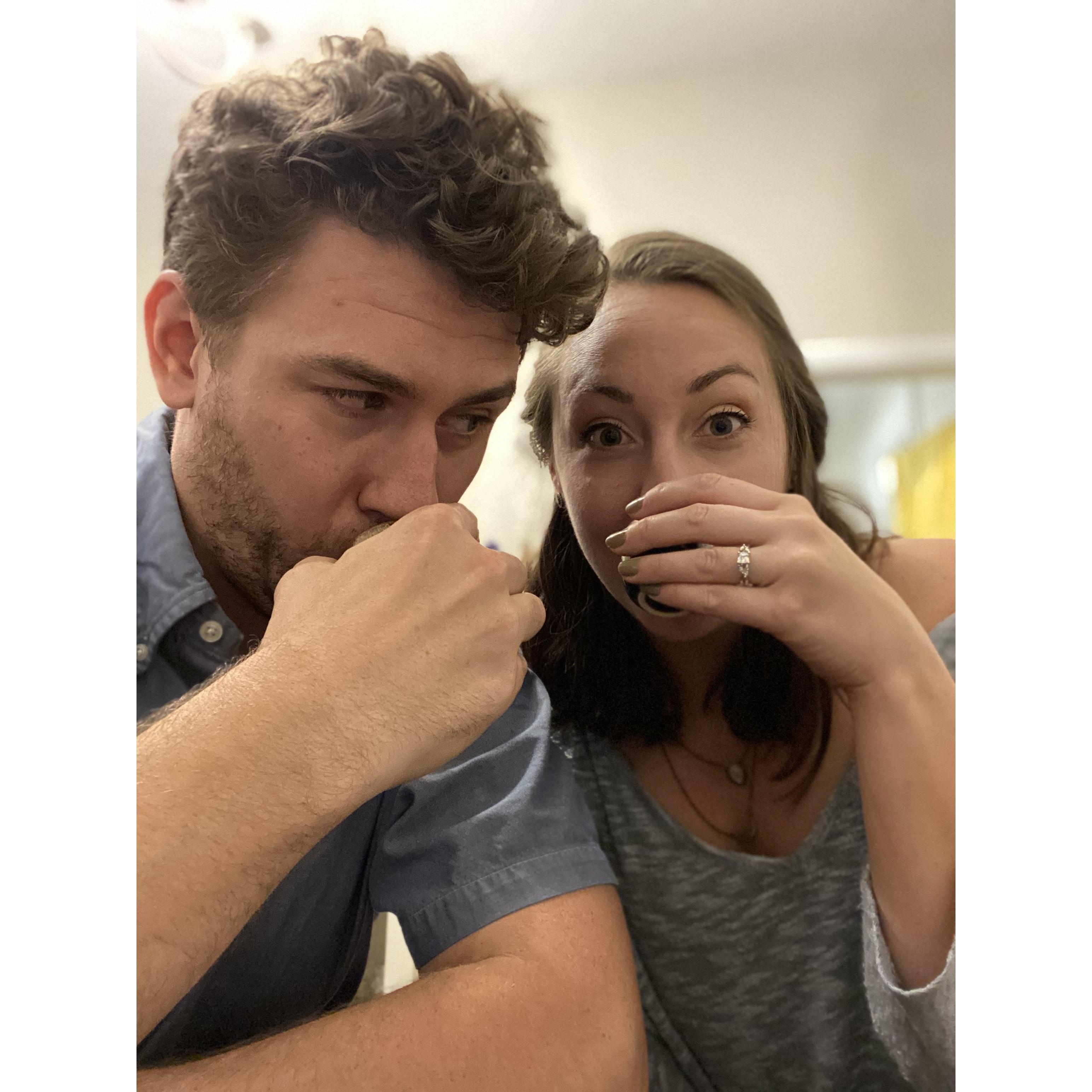 10/30/20 Denver, CO. After a treat-yo-self sushi date night, Meg came home to find (eventually) their fav sake w/ a small box before Terry dropped down on one knee. Never saw it comin', well done T.