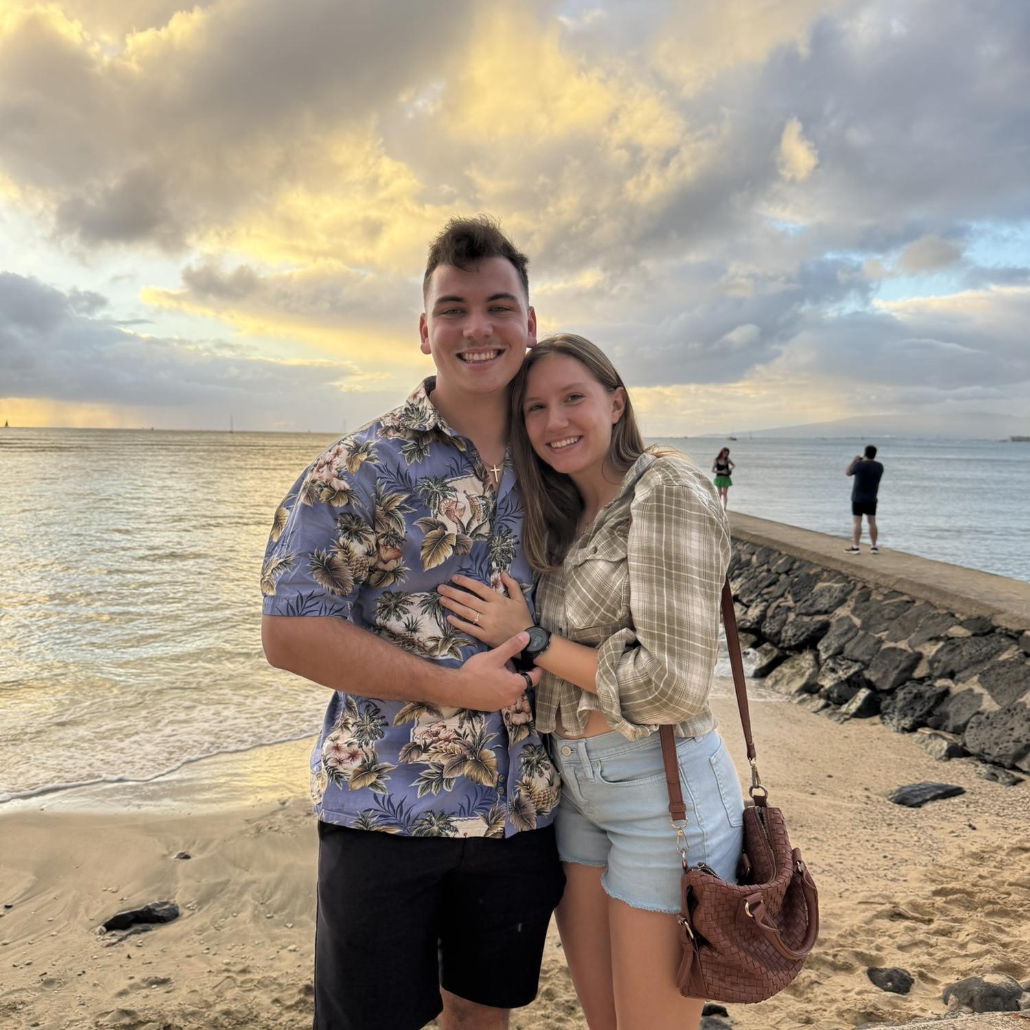 This is at Waikiki beach and this right after we got açaí and pork quesadillas at one of our favorite spots. The food was amazing, the view was beautiful, and I had my favorite person for company 🫶🏼💍.
