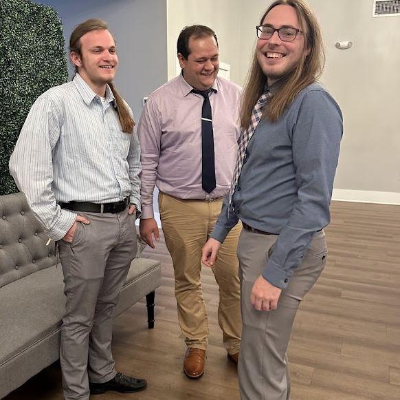 Nathanael with Jacob and Baiden at Jacob's wedding rehearsal dinner.