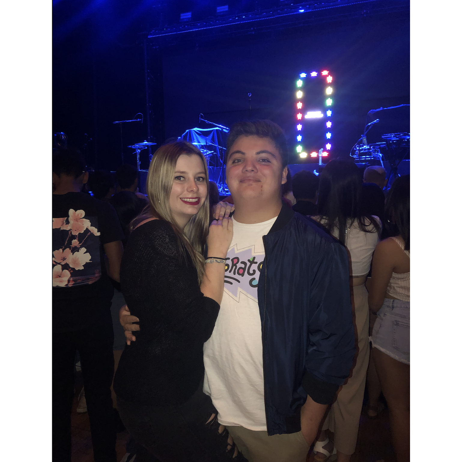 Lauv Concert ! Madi caught his guitar pick and has it framed with this photo