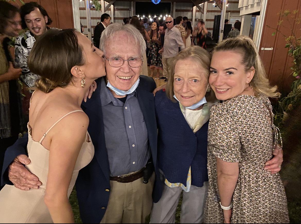 Alyssa, her poppy, her poppy’s partner Sarah and her best friend Kara at Natalie’s wedding this summer