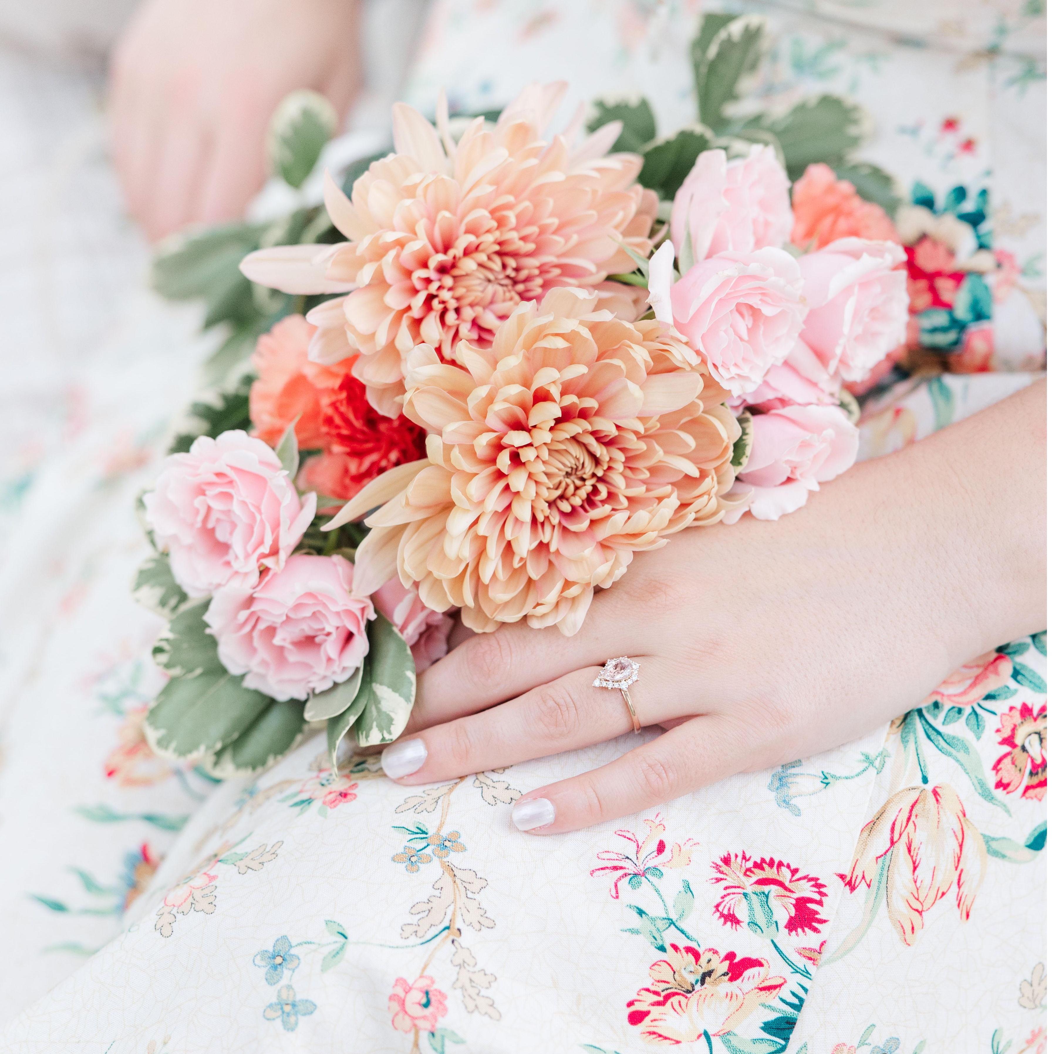 Morganite is the name of the stone in Bri's peachy pink engagement ring. He did a great job!