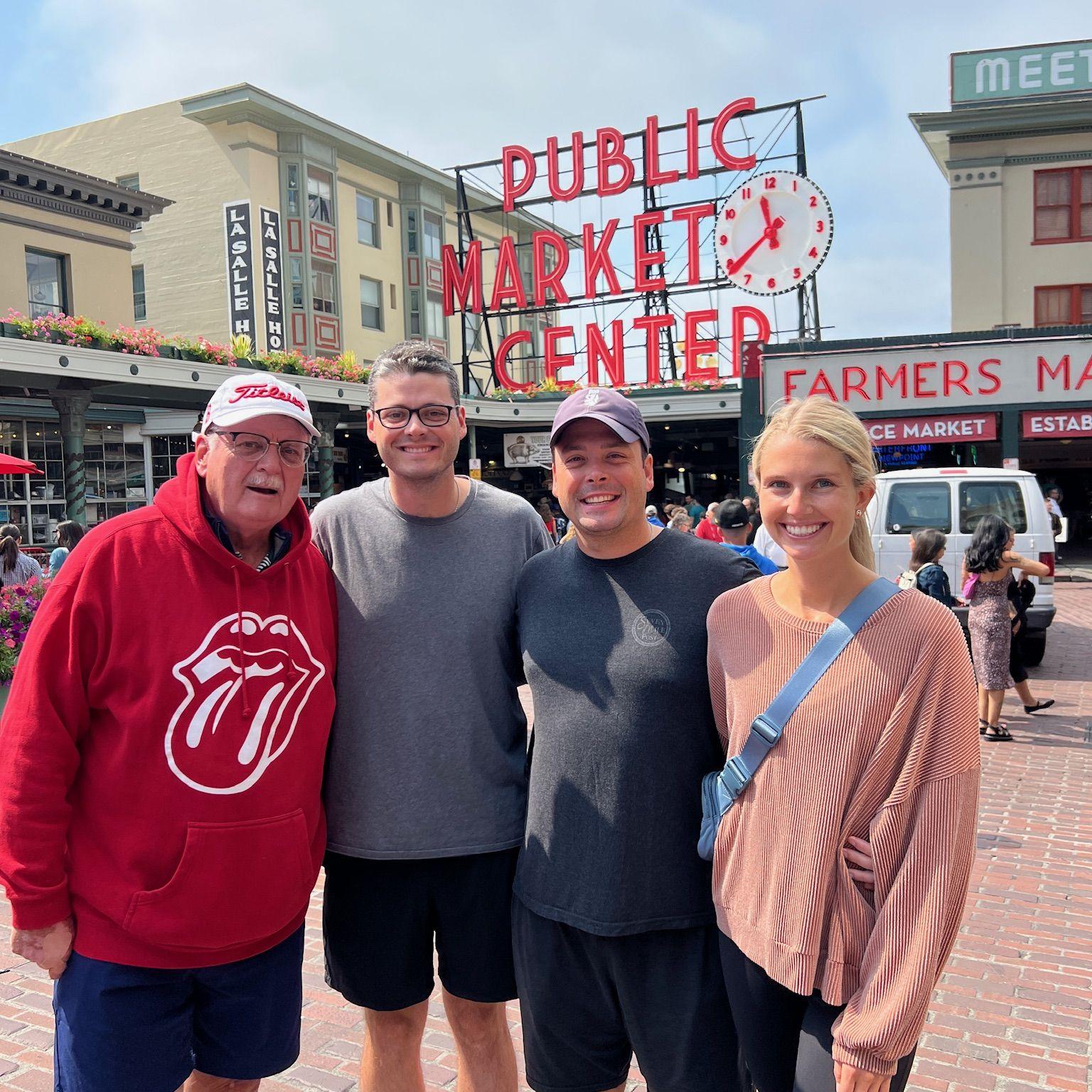Us with Jeffrey's brother, John, and his dad, Jeffrey, at the Pike Place Market in Seattle.