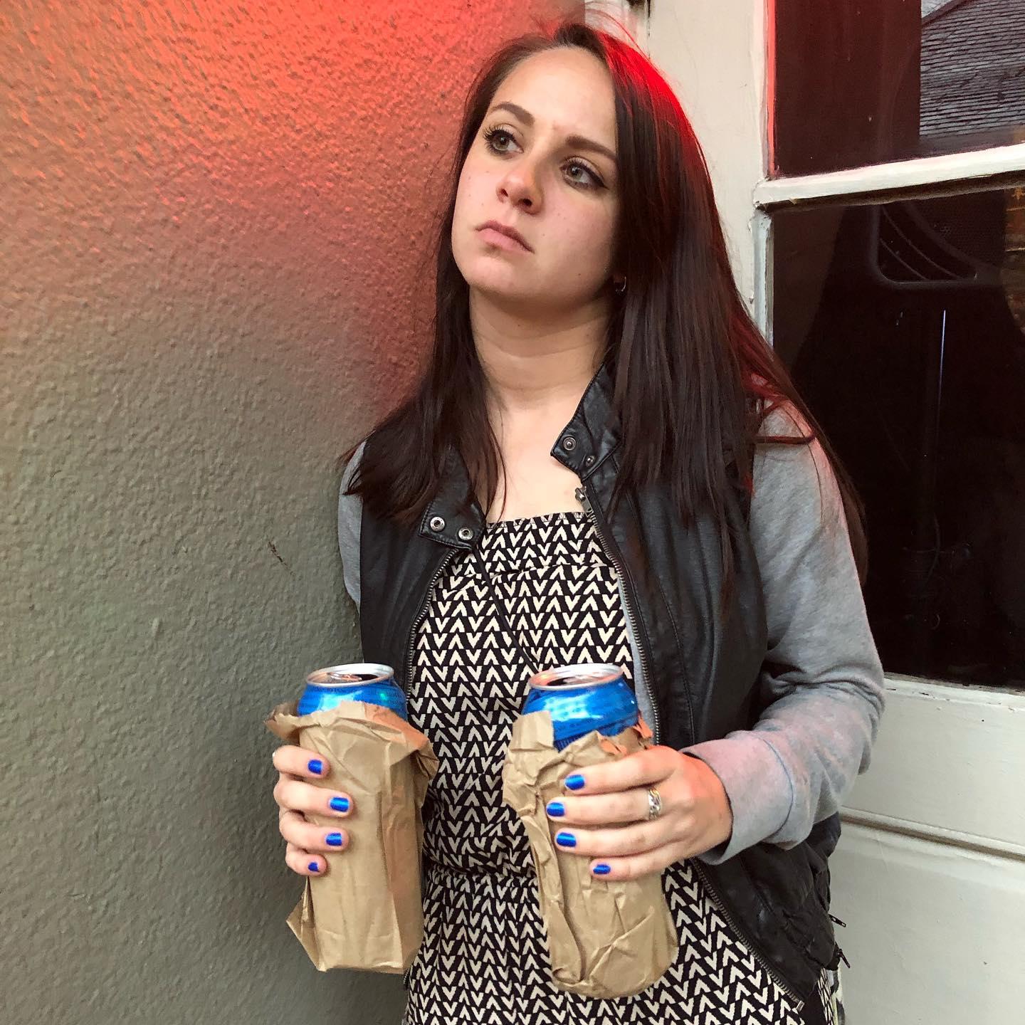 This is Zach's favorite photo of Alyssa. Taken on the street of New Orleans during Spring Break their Senior Year of College