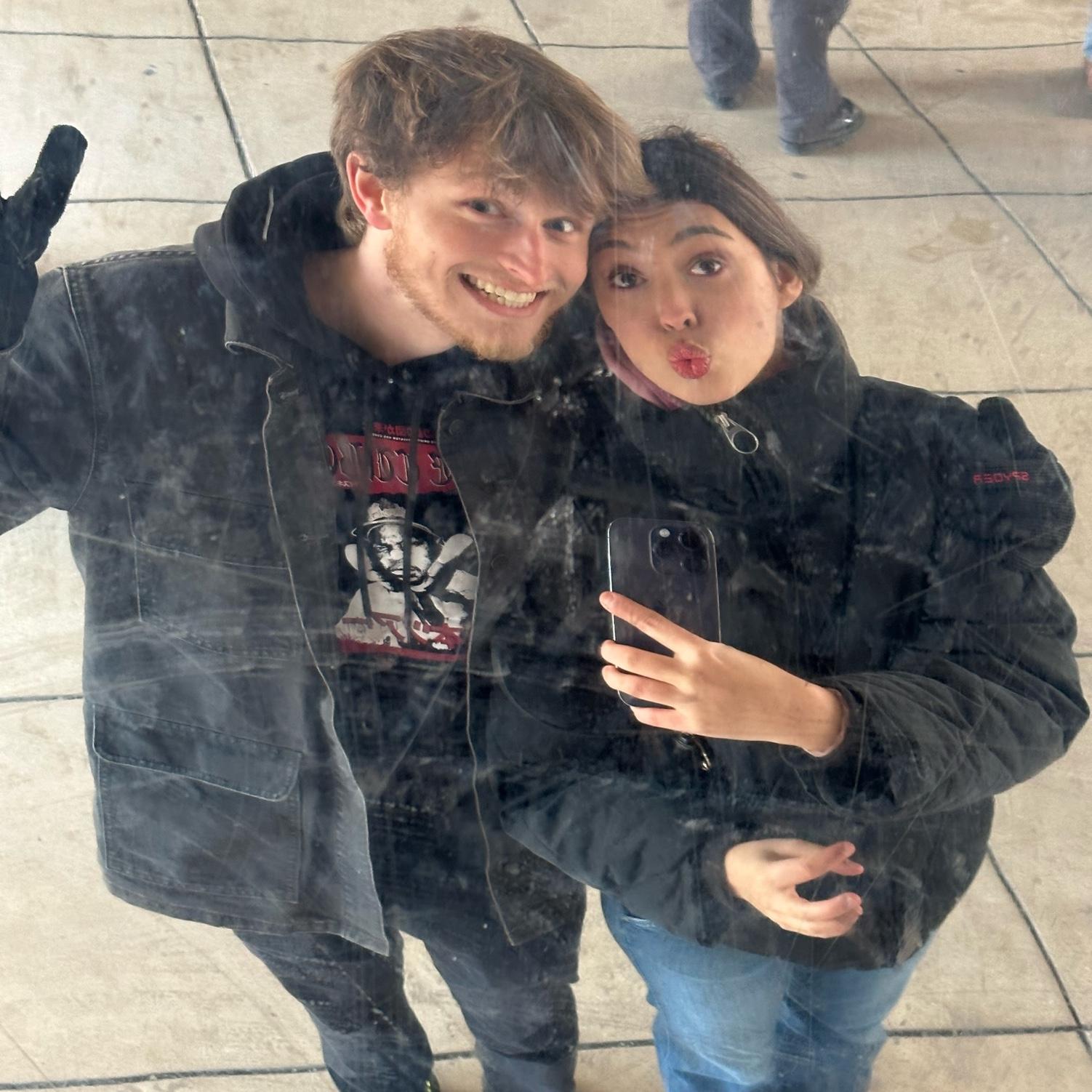 Our first trip to Chicago together - making silly faces under the famous Bean