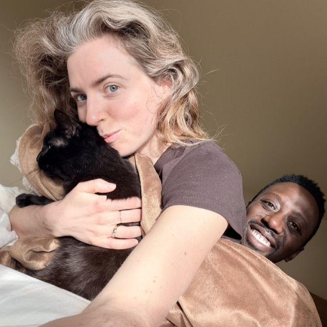 Us and Teeny Tiny (our cat)