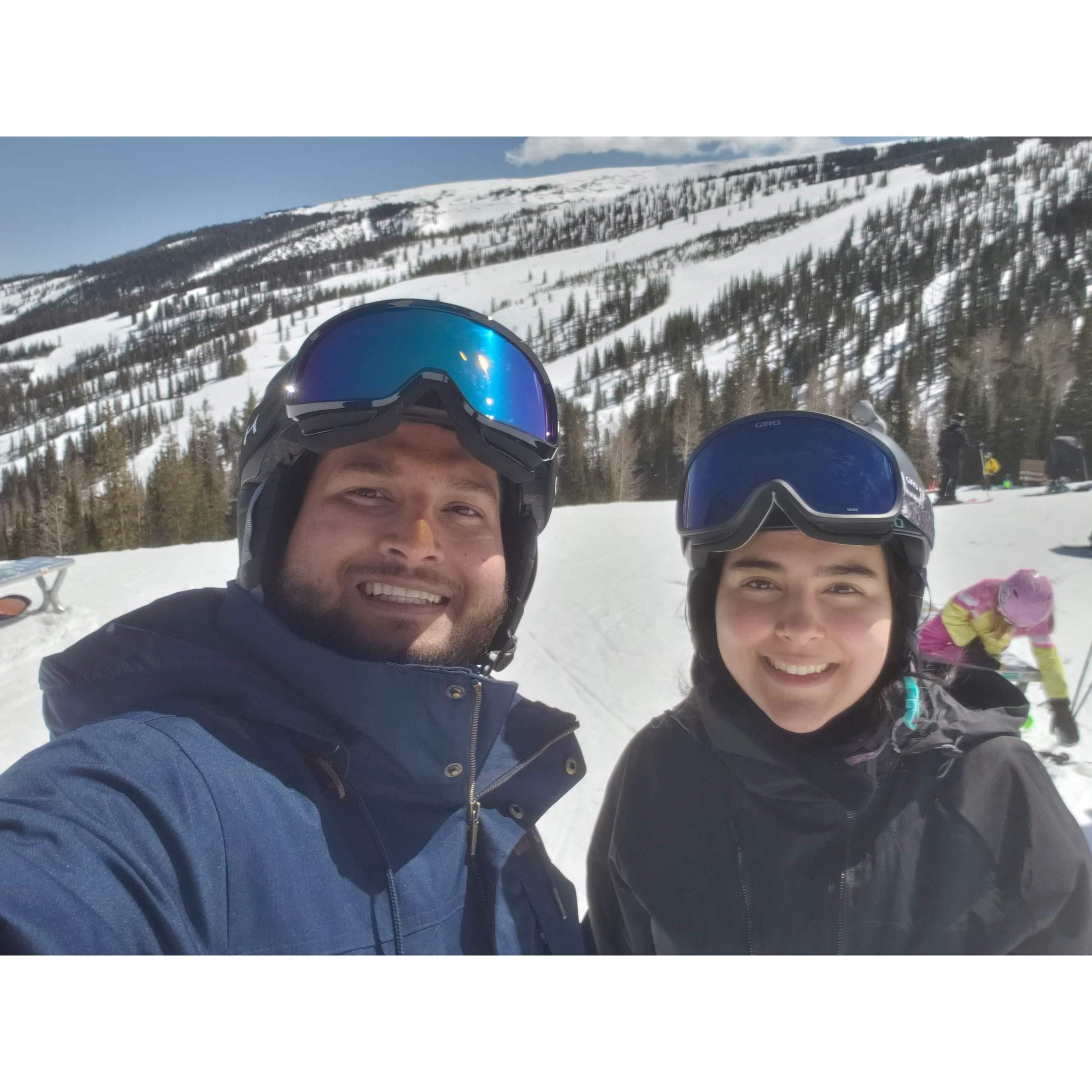 Rebecca taught Anik how to snowboard