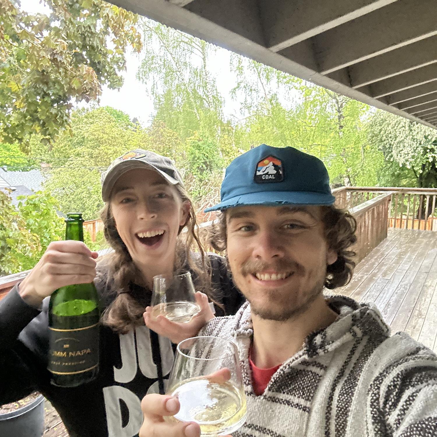 Toasting on the deck of our new home! May 2024