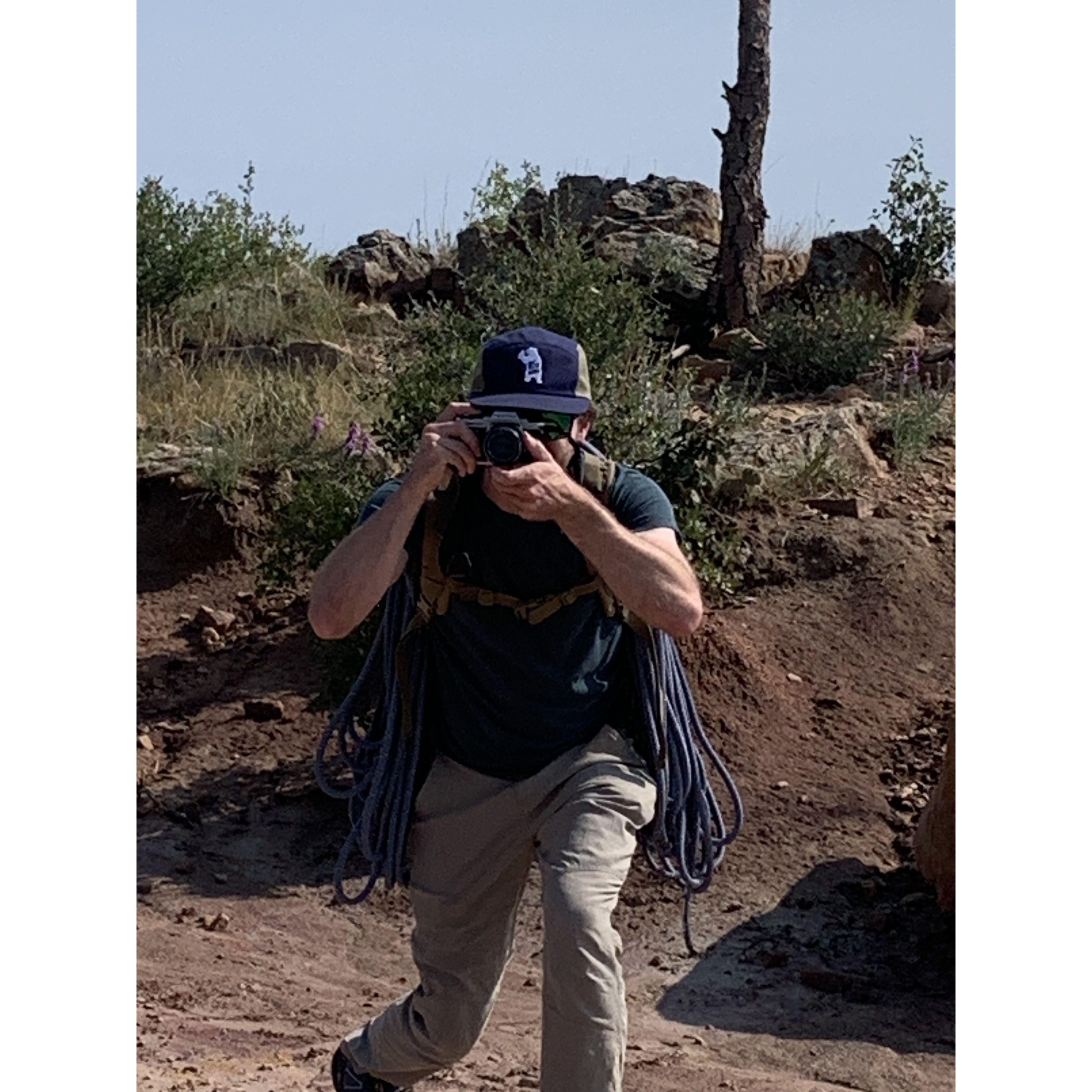 Aug 10: Here we see a rare sight, a photographer in his natural habitat, caught off guard and not realizing that the tables have been turned. These shy creatures are a strange sight indeed.