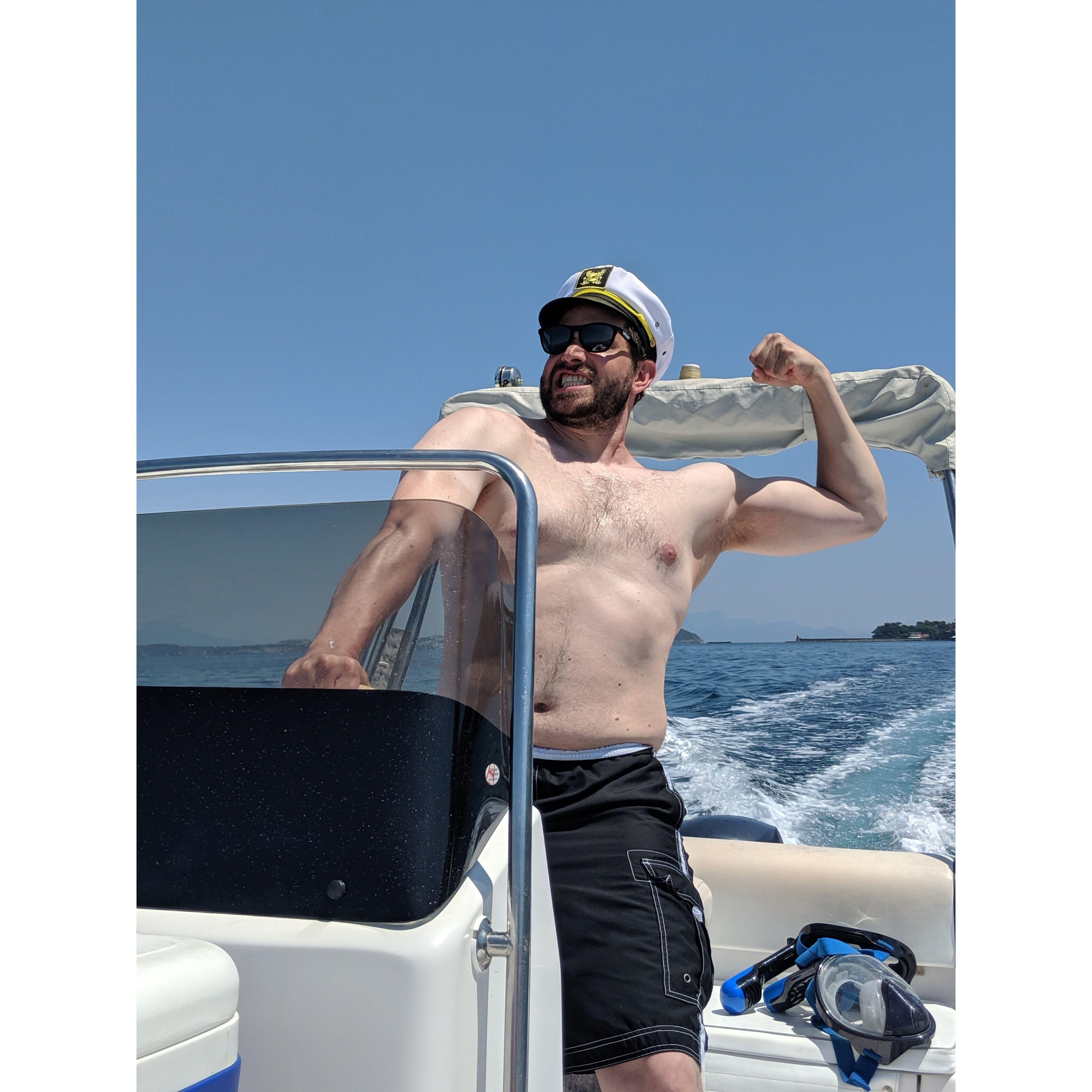 Captain Kellen driving the boat around the Tyrrhenian Sea off the coast of Naples. July 2019.