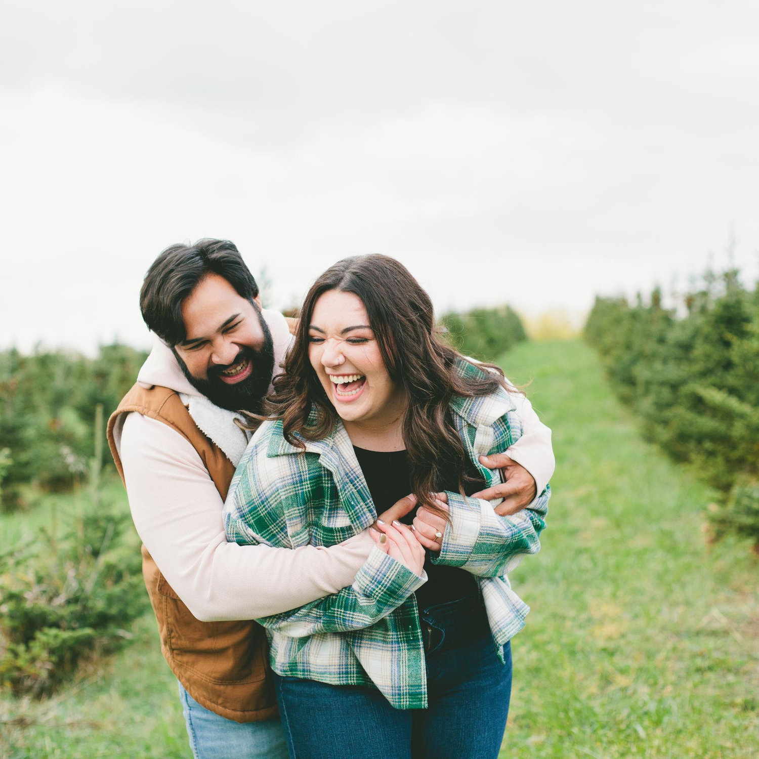 Engagement pictures-Nikolai surprised Selah by scheduling them at a Christmas tree farm!