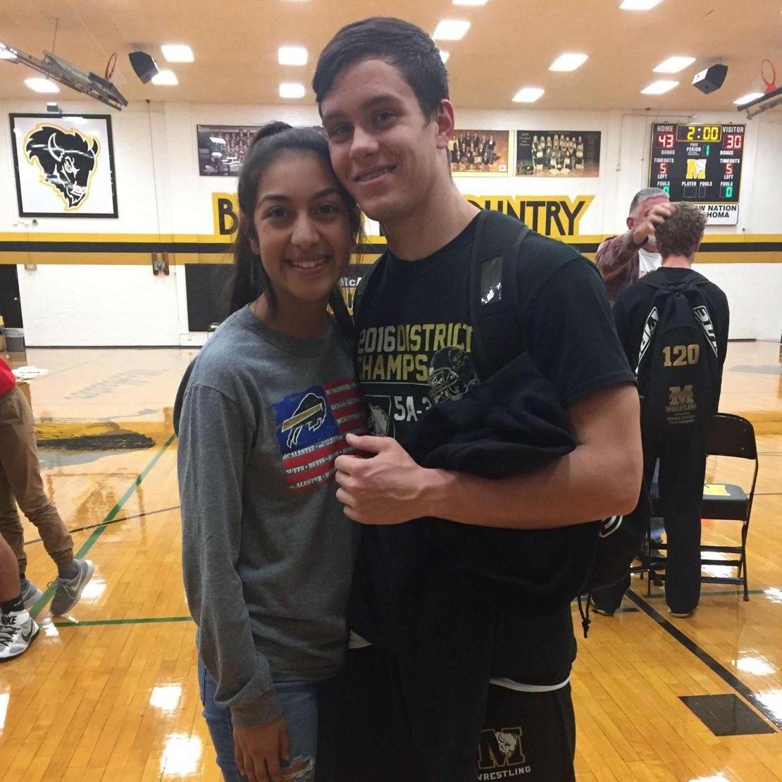 Always supporting! High School wrestling match. GO Shane!