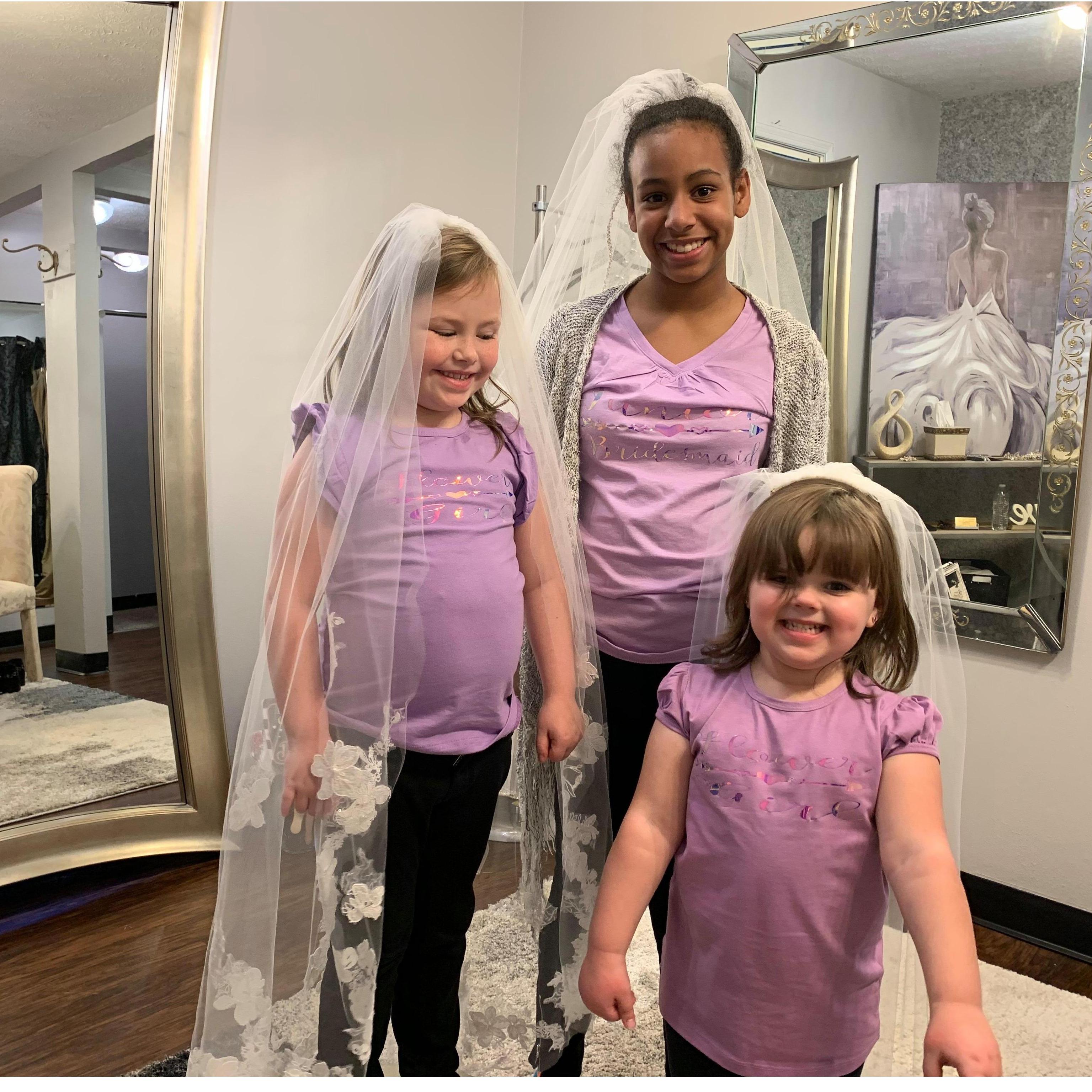 What the girls did when the Bride was trying on dresses!