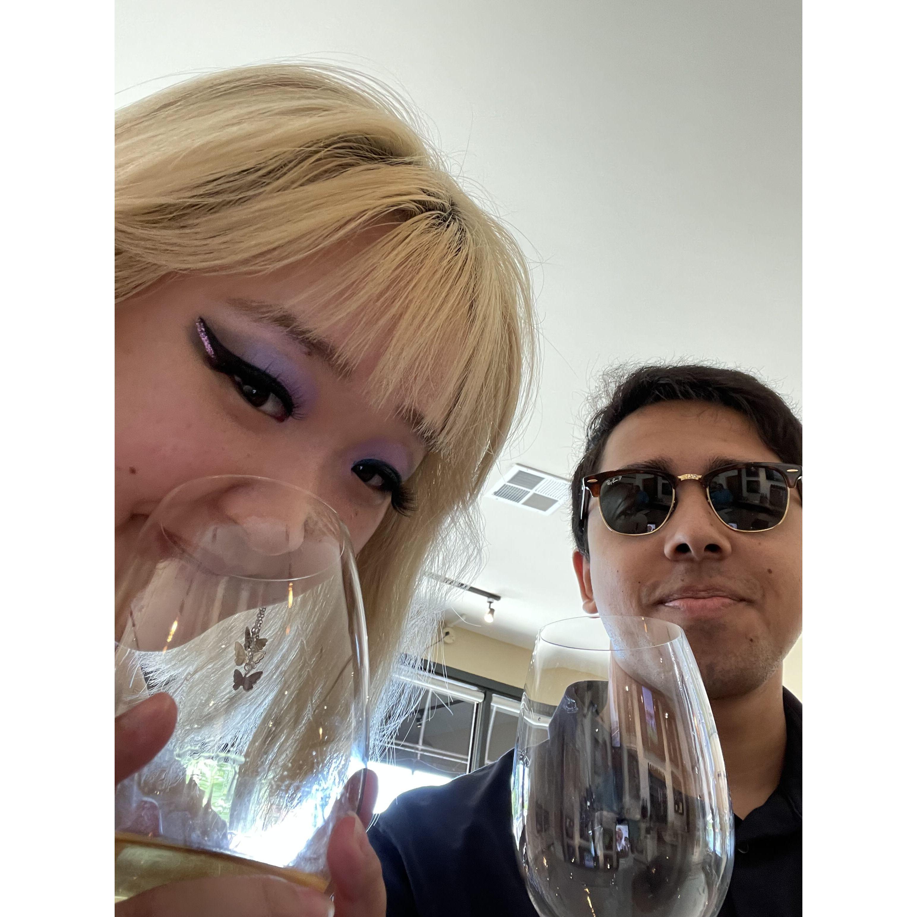 He takes her out of her comfort zone. She does not like wine but they did a wine tasting anyways!