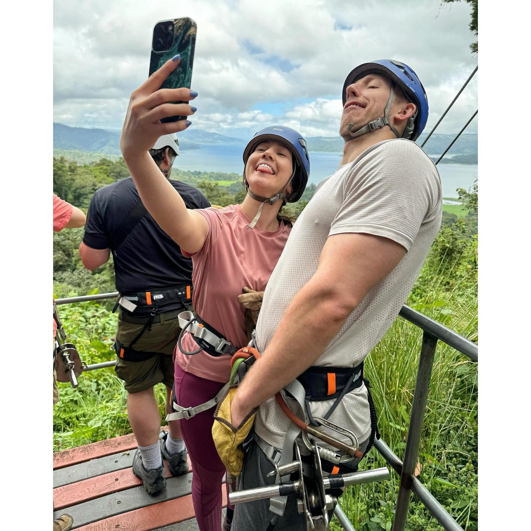 Entertaining ourselves while waiting to zipline across the Costa Rican rainforest