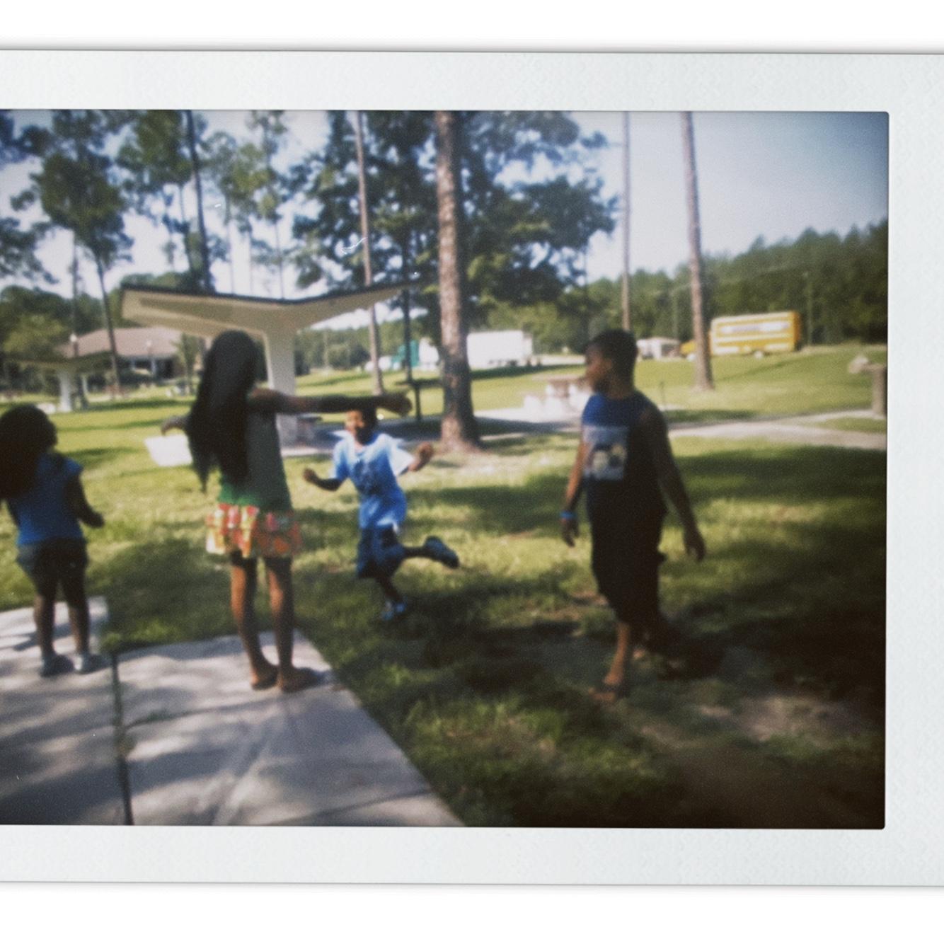 Richie (brother) running into Preye's arms.