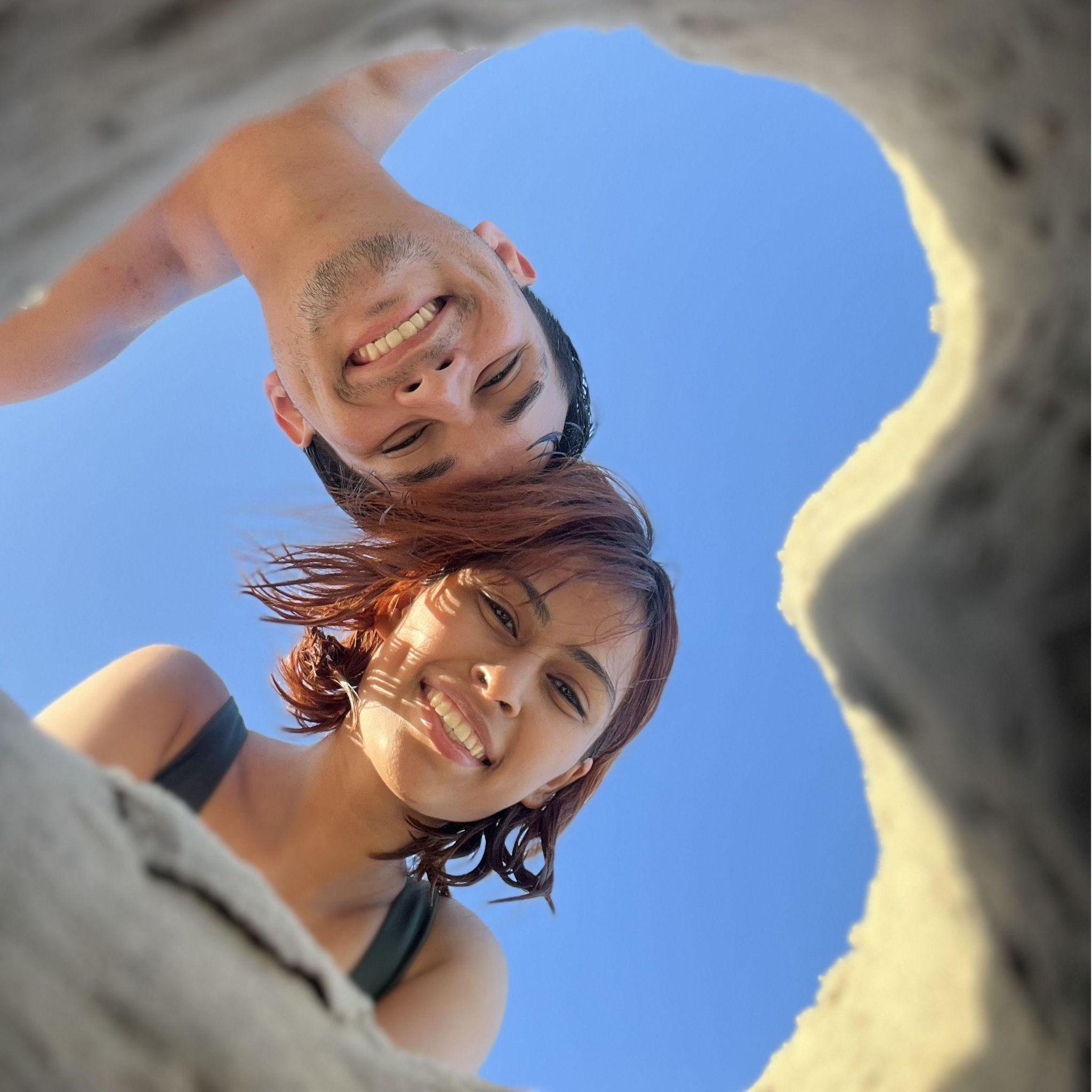 Building a sand heart together.