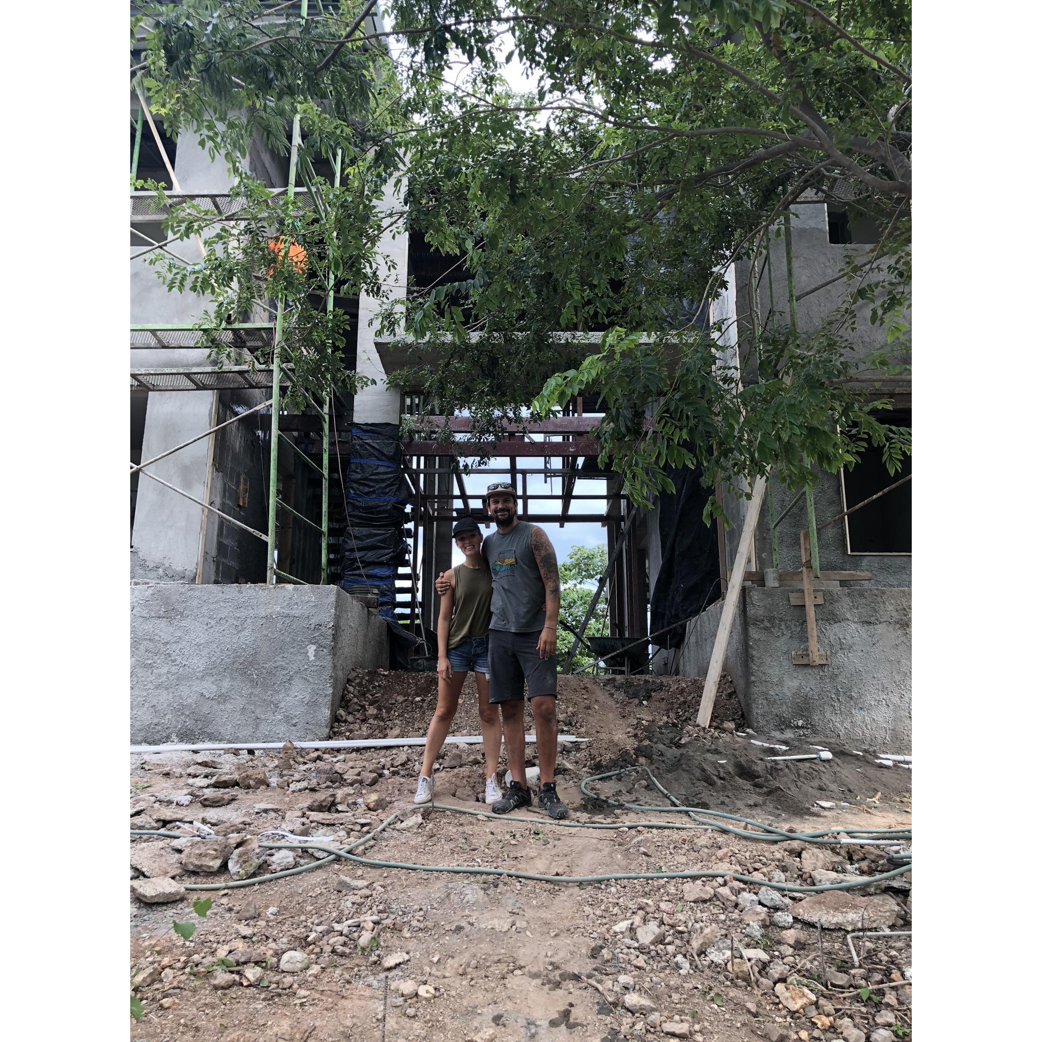 Standing in front of the house we designed together in Costa Rica... Mid-construction