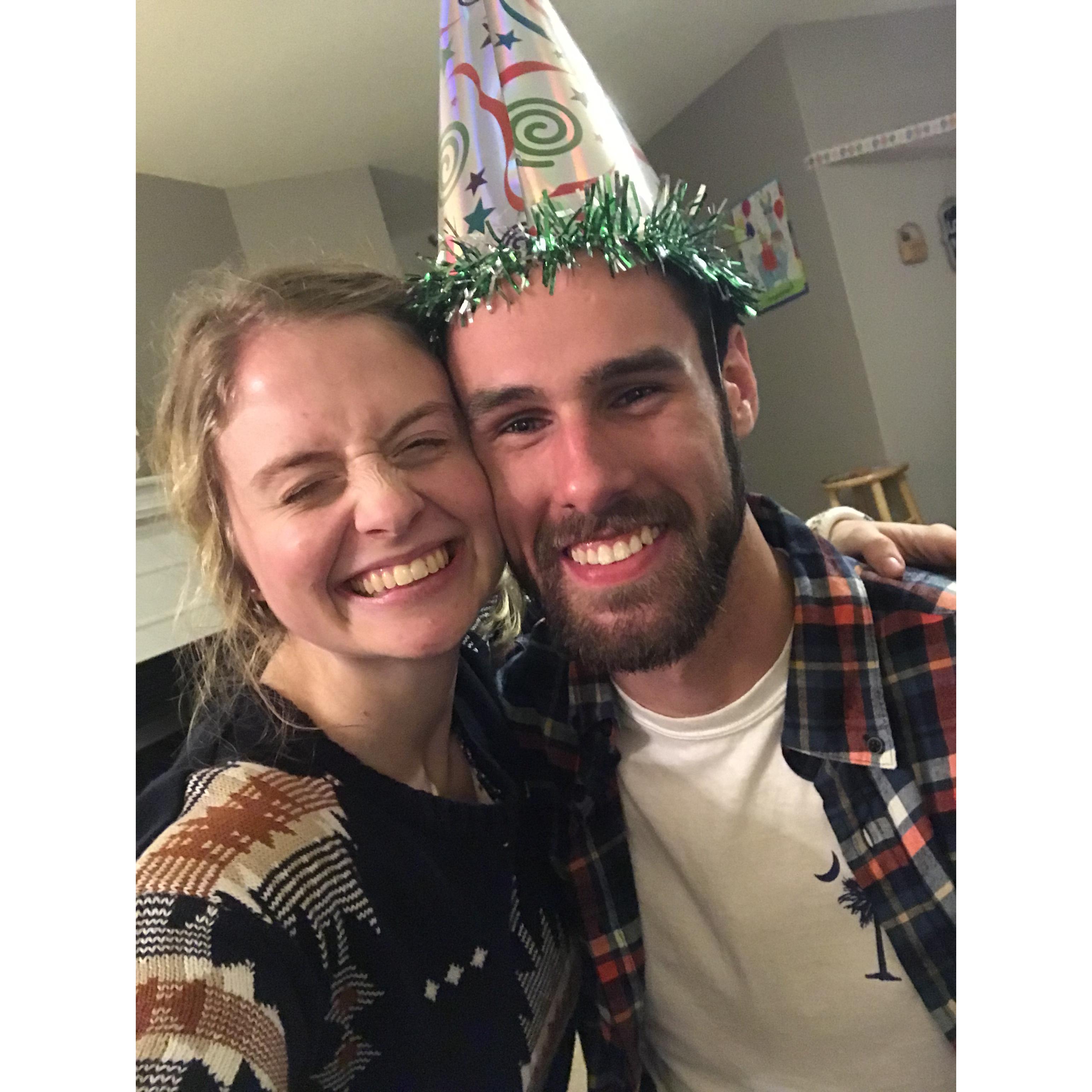I threw him a surprise birthday party. Complete with a massive birthday hat.