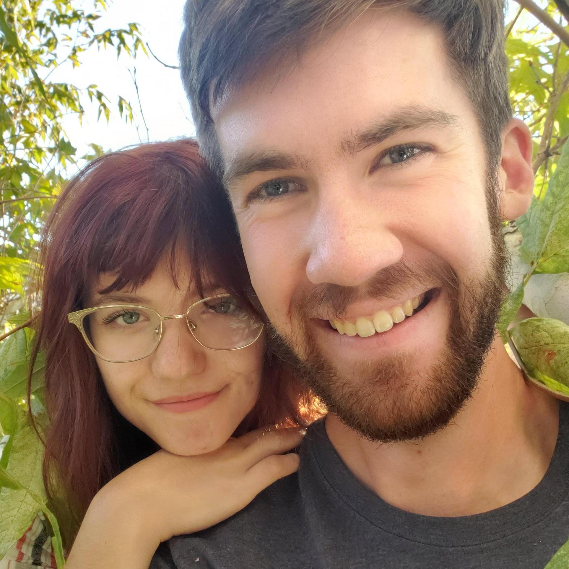 Climbing a tree together.