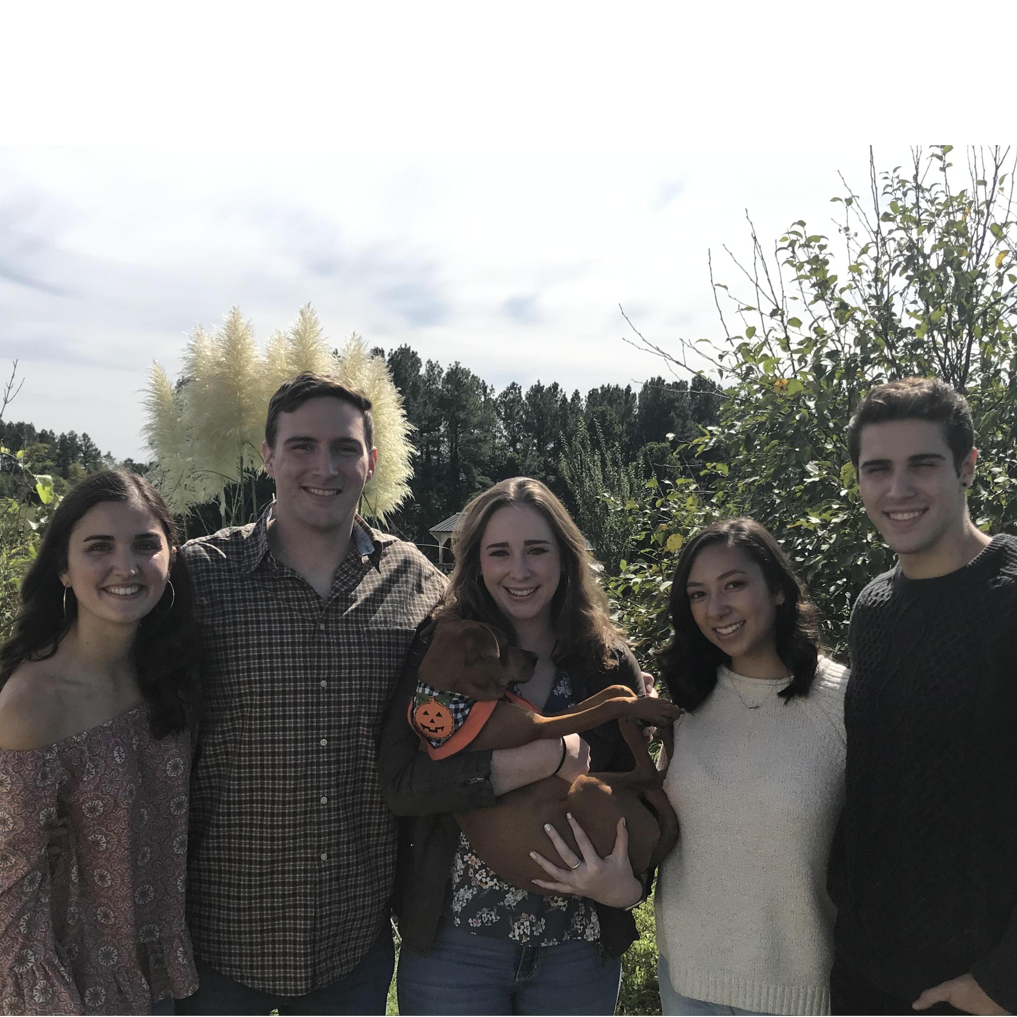 Celebrating fall with Maddie, Connor, Jordan, and (the puppy) Meg! (from left to right)