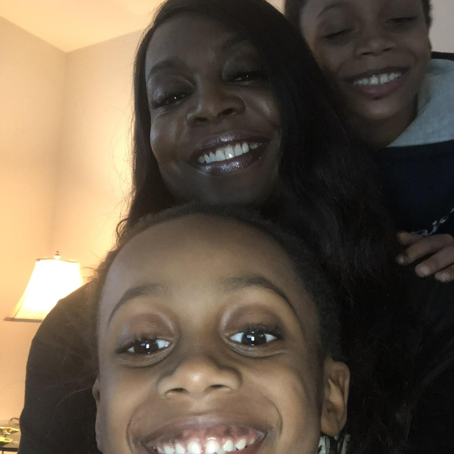 Giovanni our grandson in back of me is a lil shy but when he smiles watch out now! LOL  Gabriel is our grandson in front of me and his smile game is amazing as well!