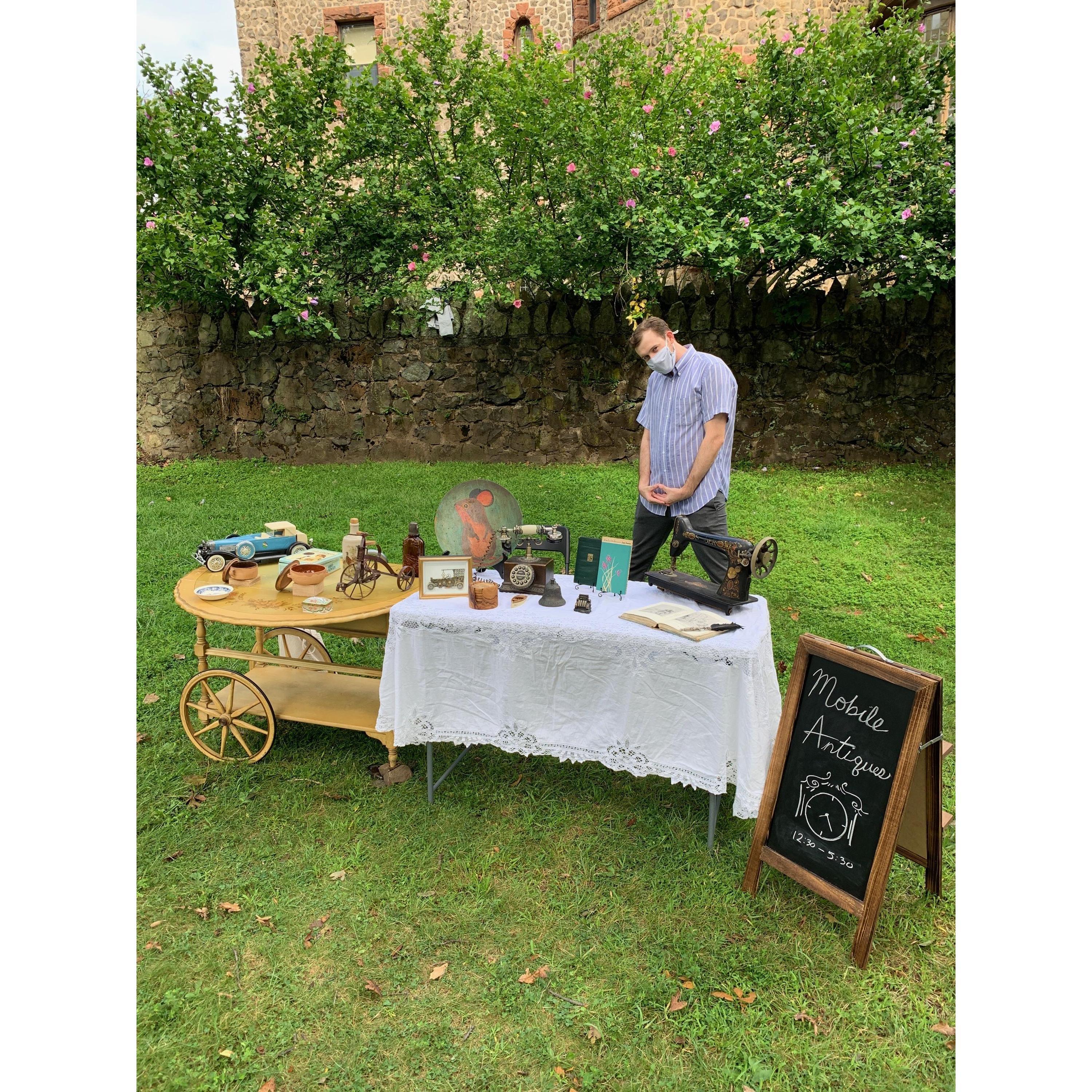 Peter, pretend salesman, is the ULTIMATE MVP. Knowing Nardine's inquisitive nature, he writes up individual stories to the hand selected antique pieces that Andrew purchased to make the pop up so real