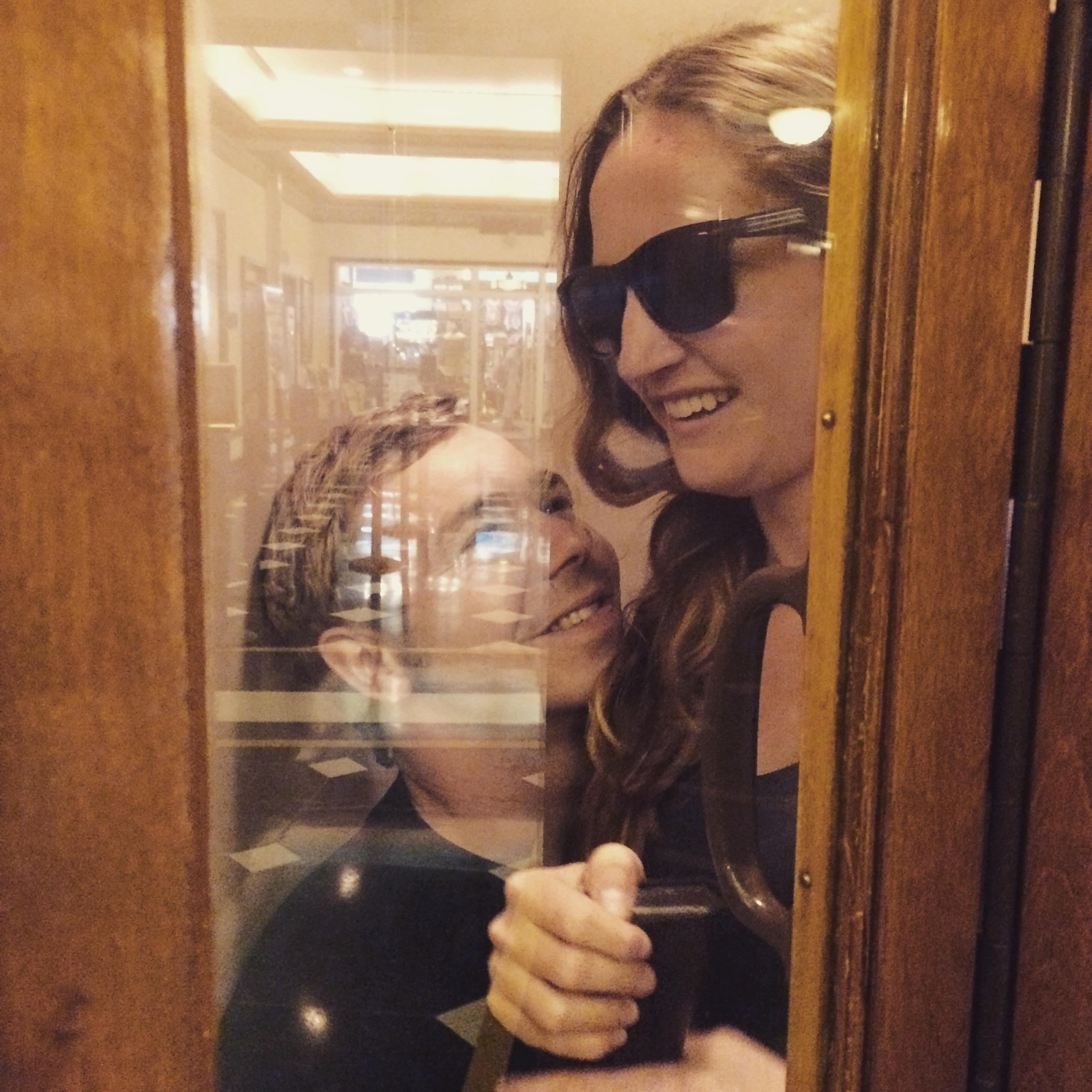 In an old fashioned phone booth...