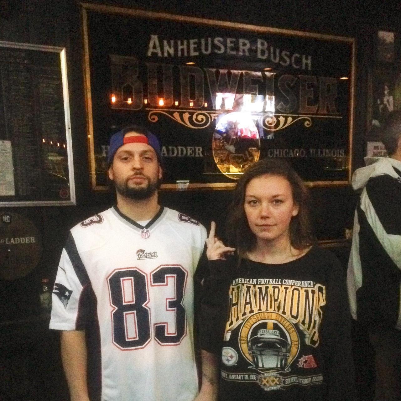 Gretchen being a supportive girlfriend during the Patriots-Steelers game