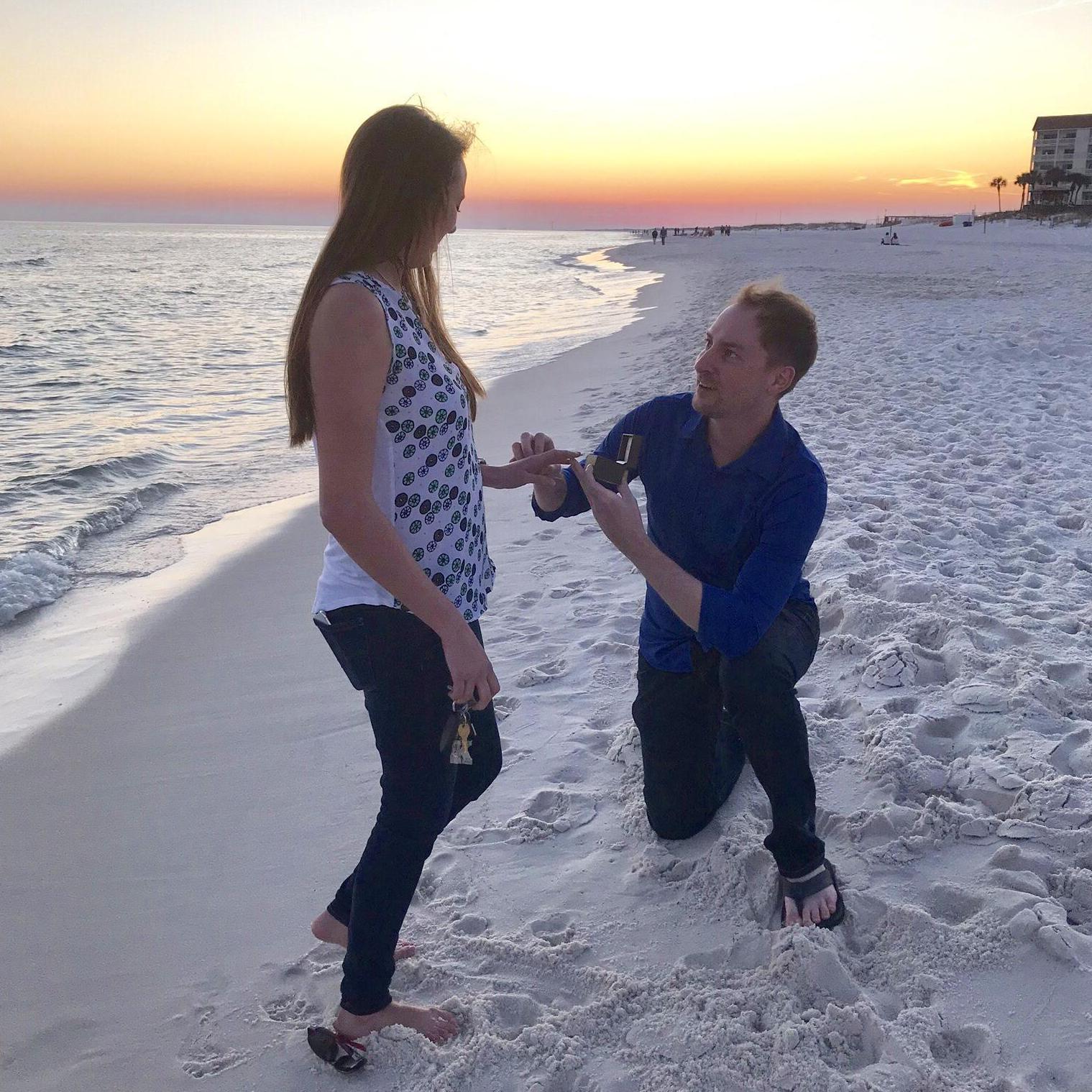I knew the proposal was coming, but on the actual day it was a complete surprise! My family and I were taking pictures on the beach and he snuck up behind me. It was perfect!