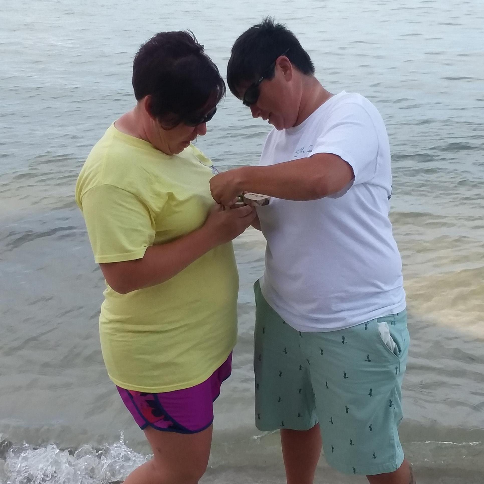 Yup those are tears coming from her face...the proposal was a shocker! For the kids too, Dakota was taking the pictures and almost dropped Amanda's phone in the water...(2018)