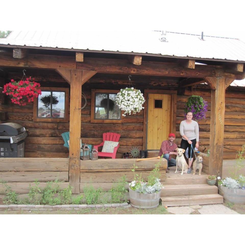 Photo of us and our two dogs, Eddie and Chica, the first summer we were in our home.