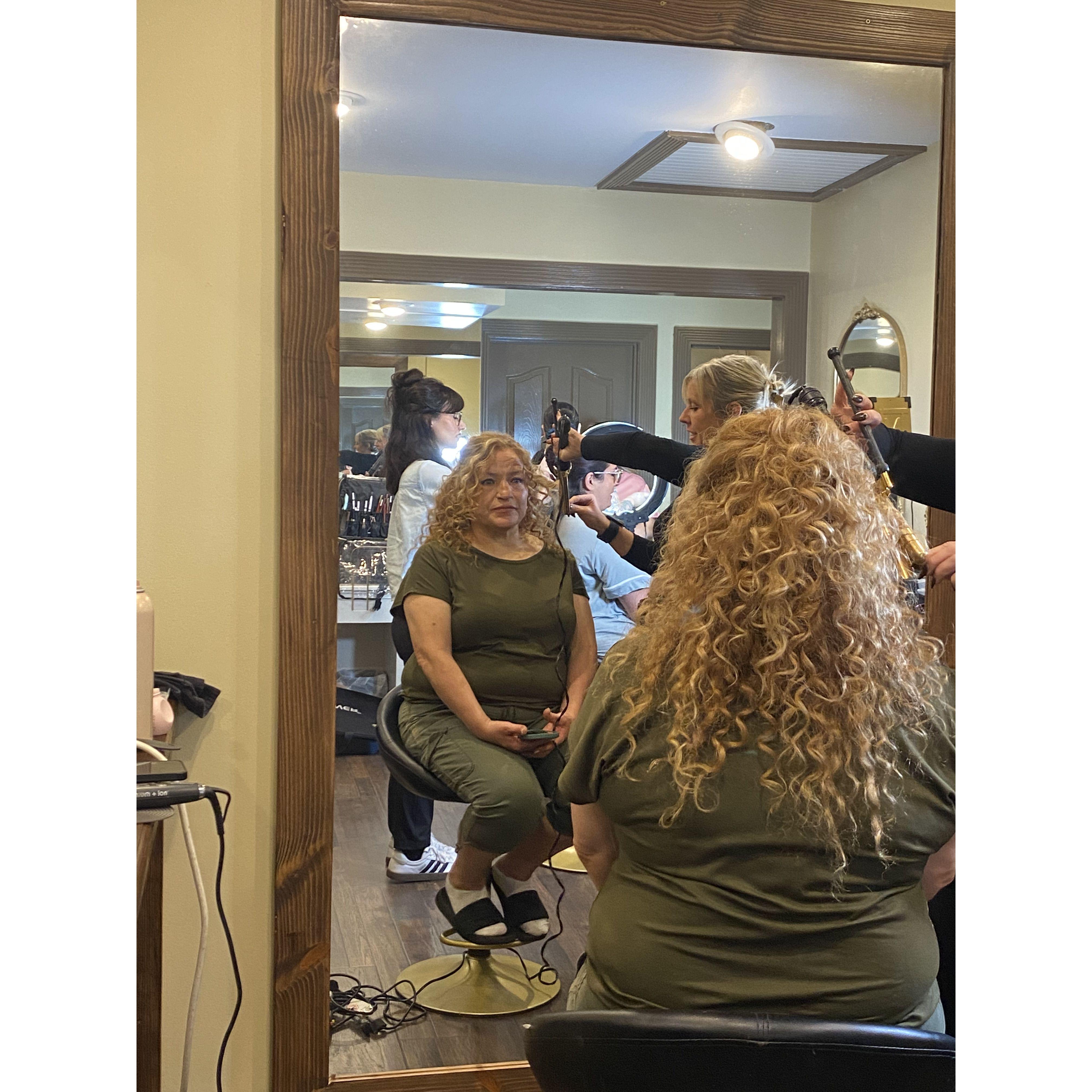 Isavel getting her hair done