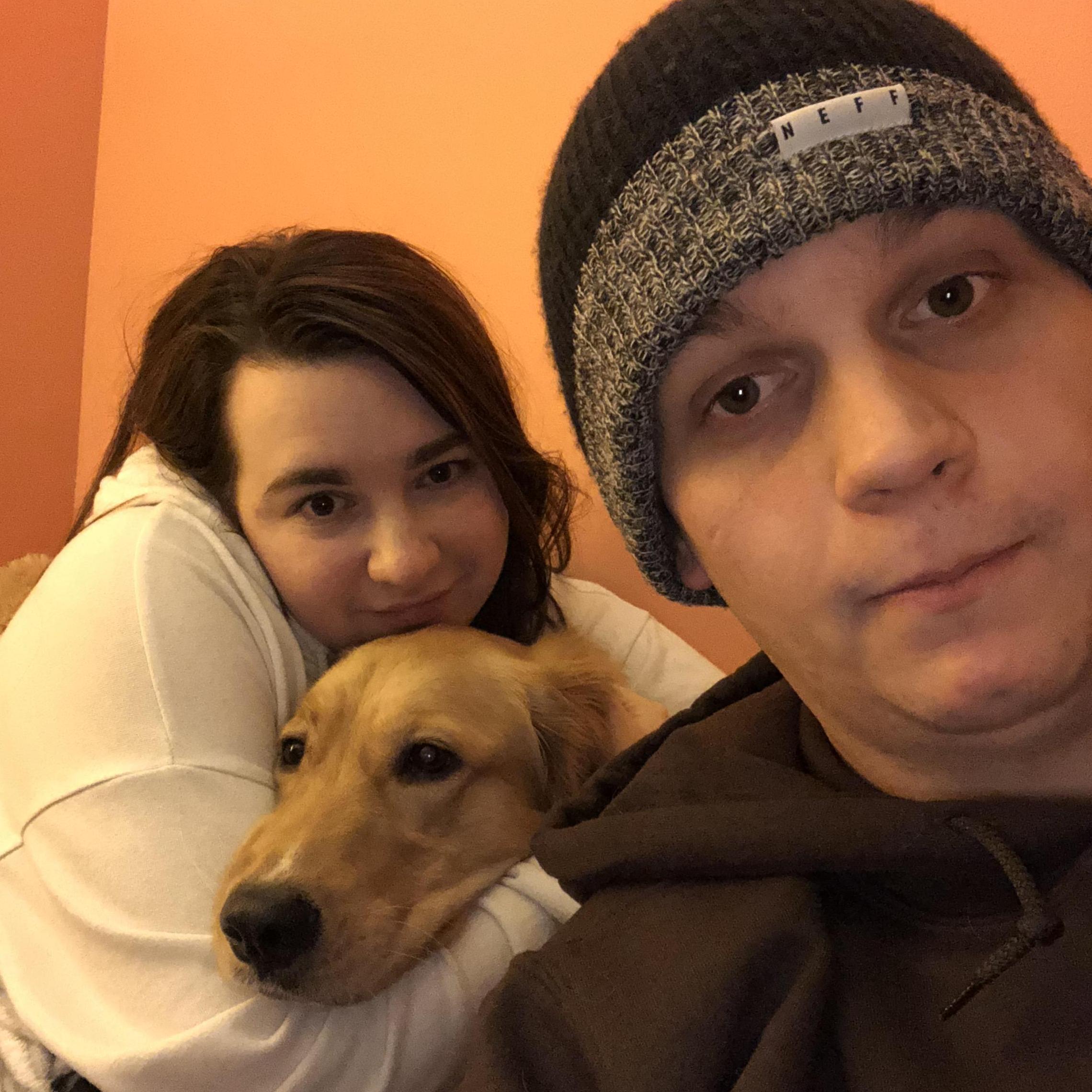 A family photo of Nick, Mia, and Bailey.