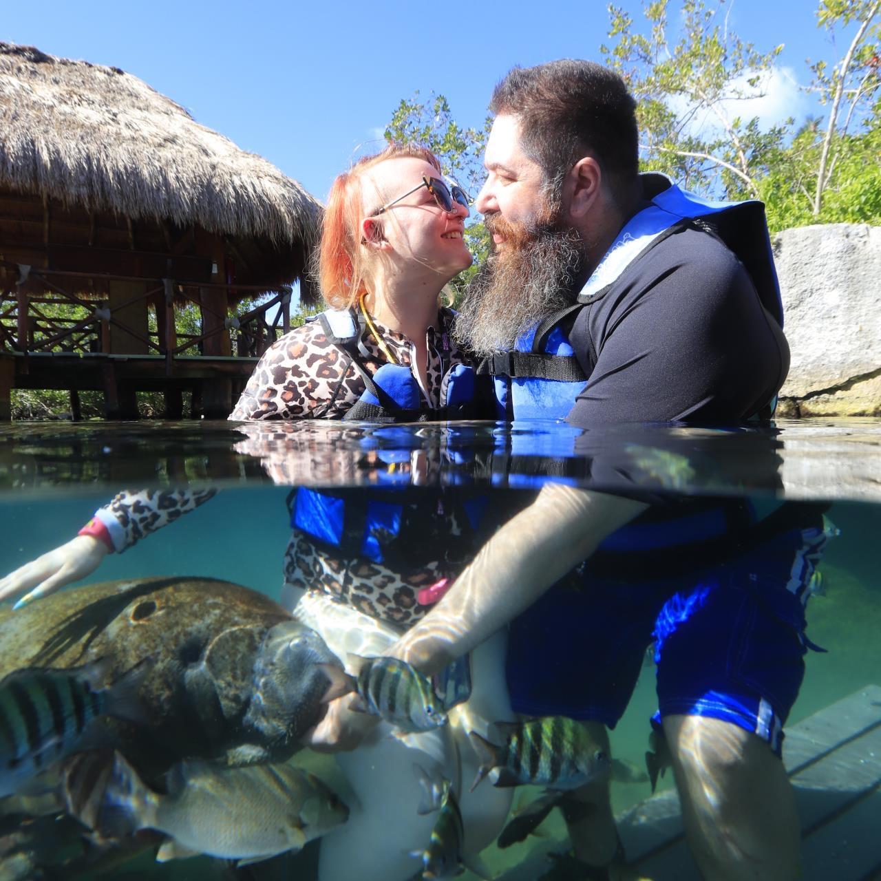 Petting manatees in Mexico