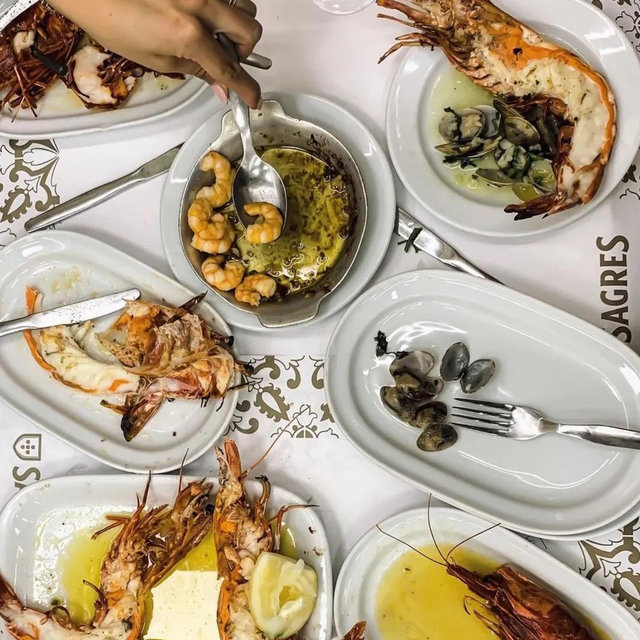 Treat us to a traditional Portuguese dinner at Cervejaria Ramiro!