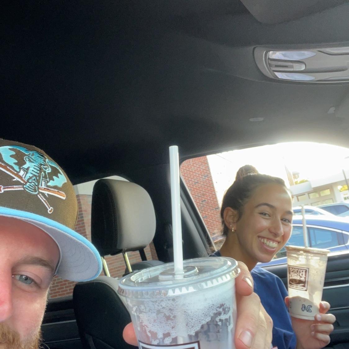 Billy brings Grace a milkshake on her lunchbreak.