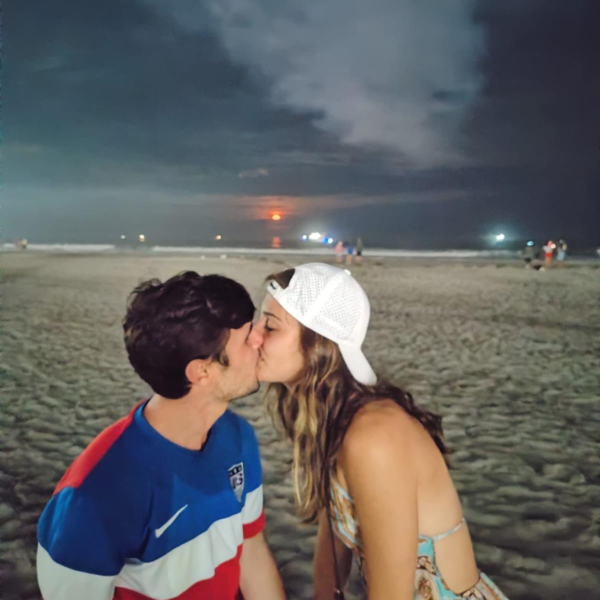 James and Charlotte celebrating the Fourth of July with a smooch