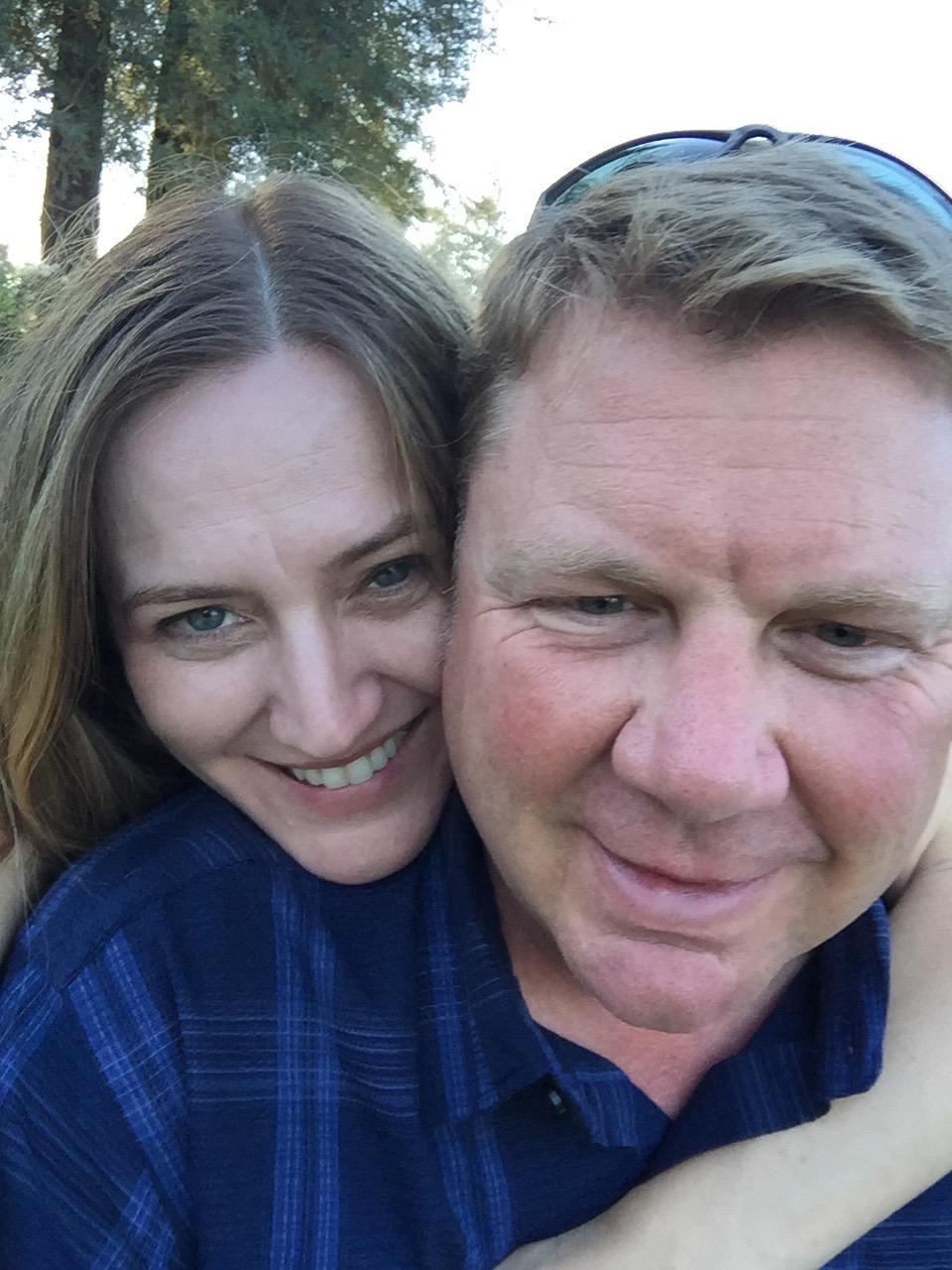 Happiness in a rose garden in the California sun.