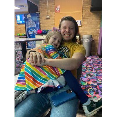 Aunt and Uncle date day at the bowling alley with Victoria.