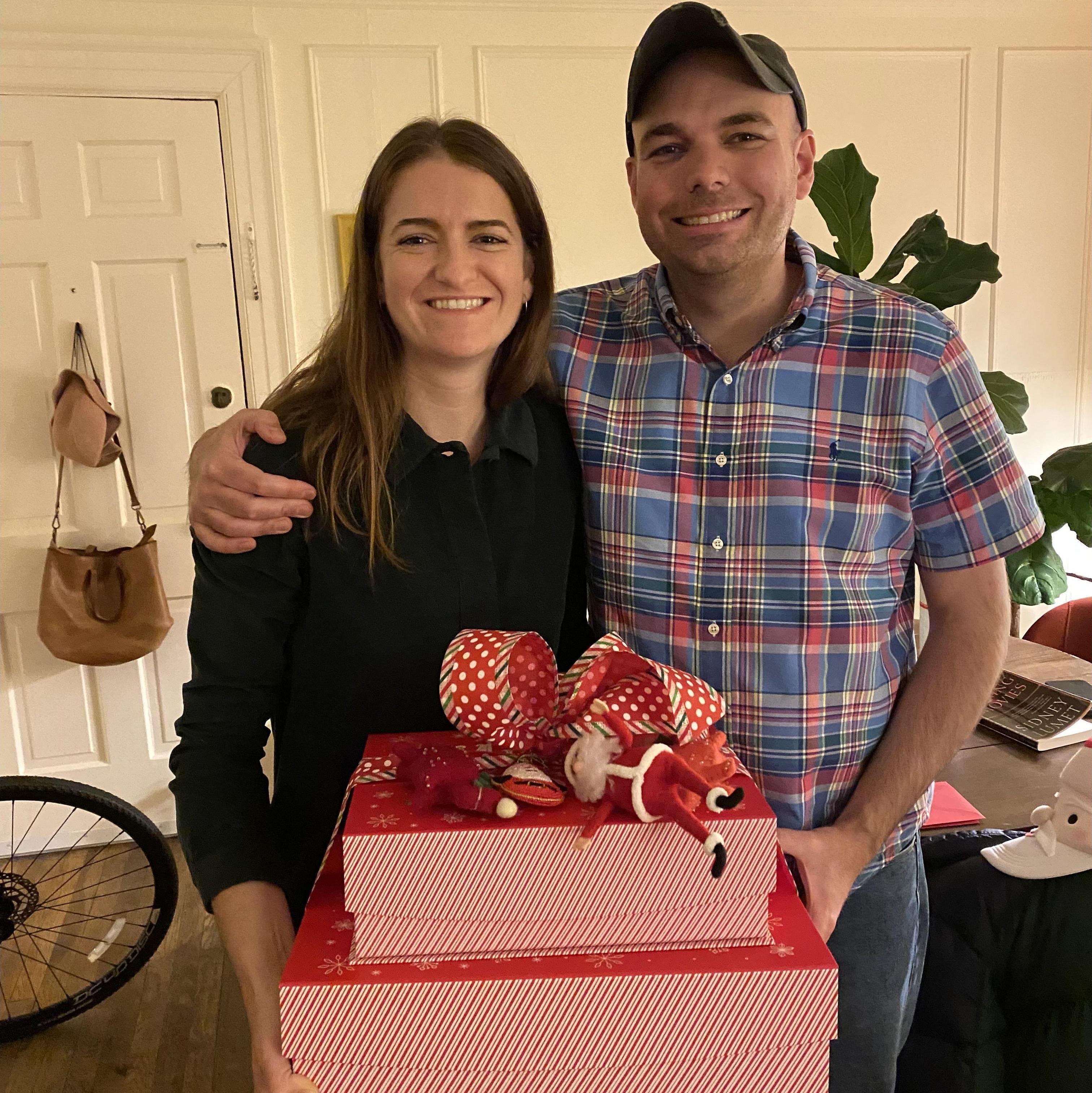 Here we are holding a gift beautifully wrapped by Jack's mom Gretchen!