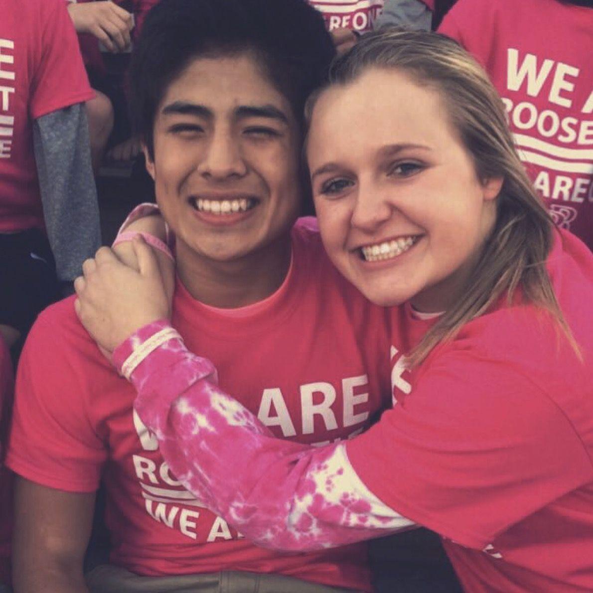 2017 - Here we were High School Seniors at a "pink out" football game.