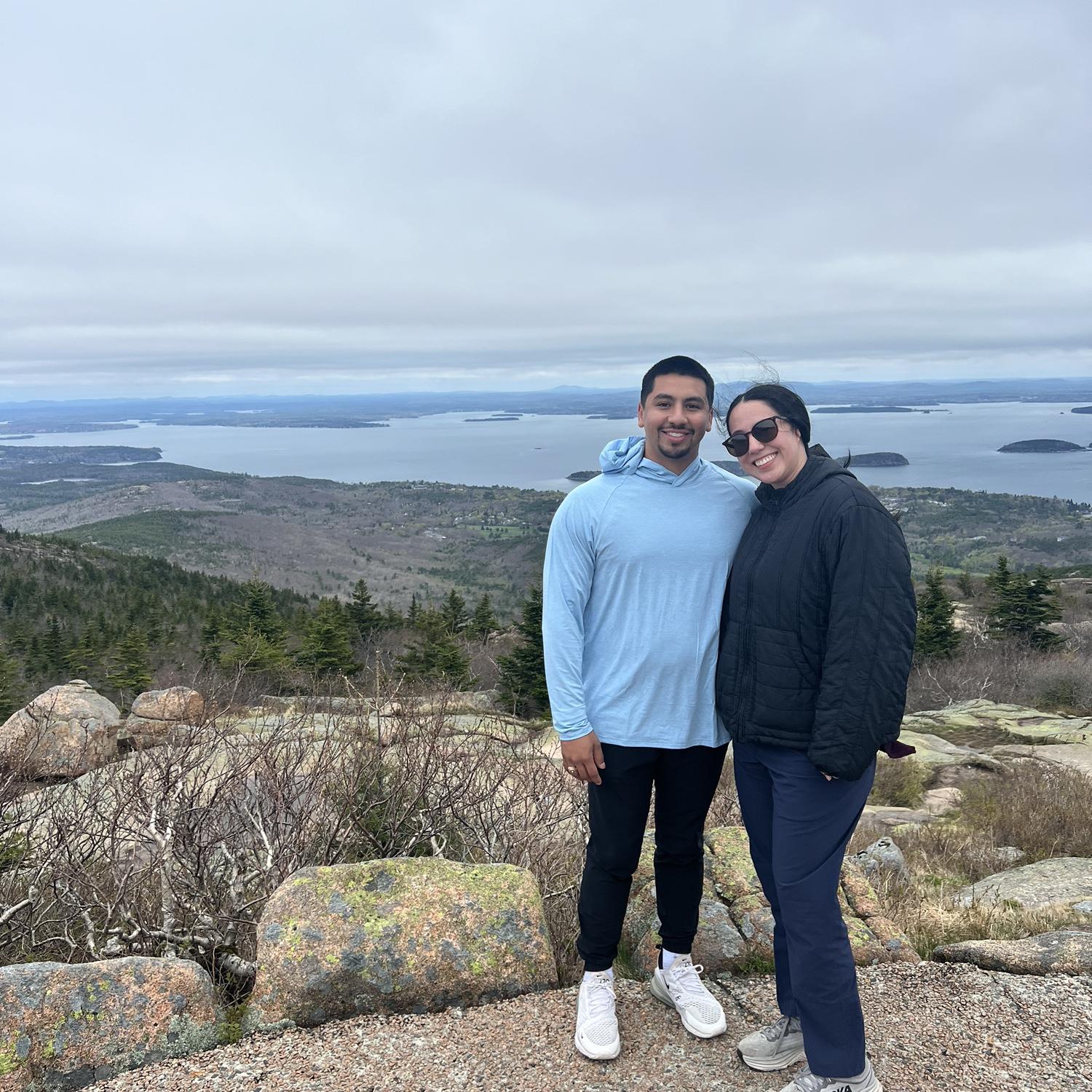 From our trip to Maine! We are at the top of Cadillac Mountain in Acadia National Park, overlooking Bar Harbor. - May 2025