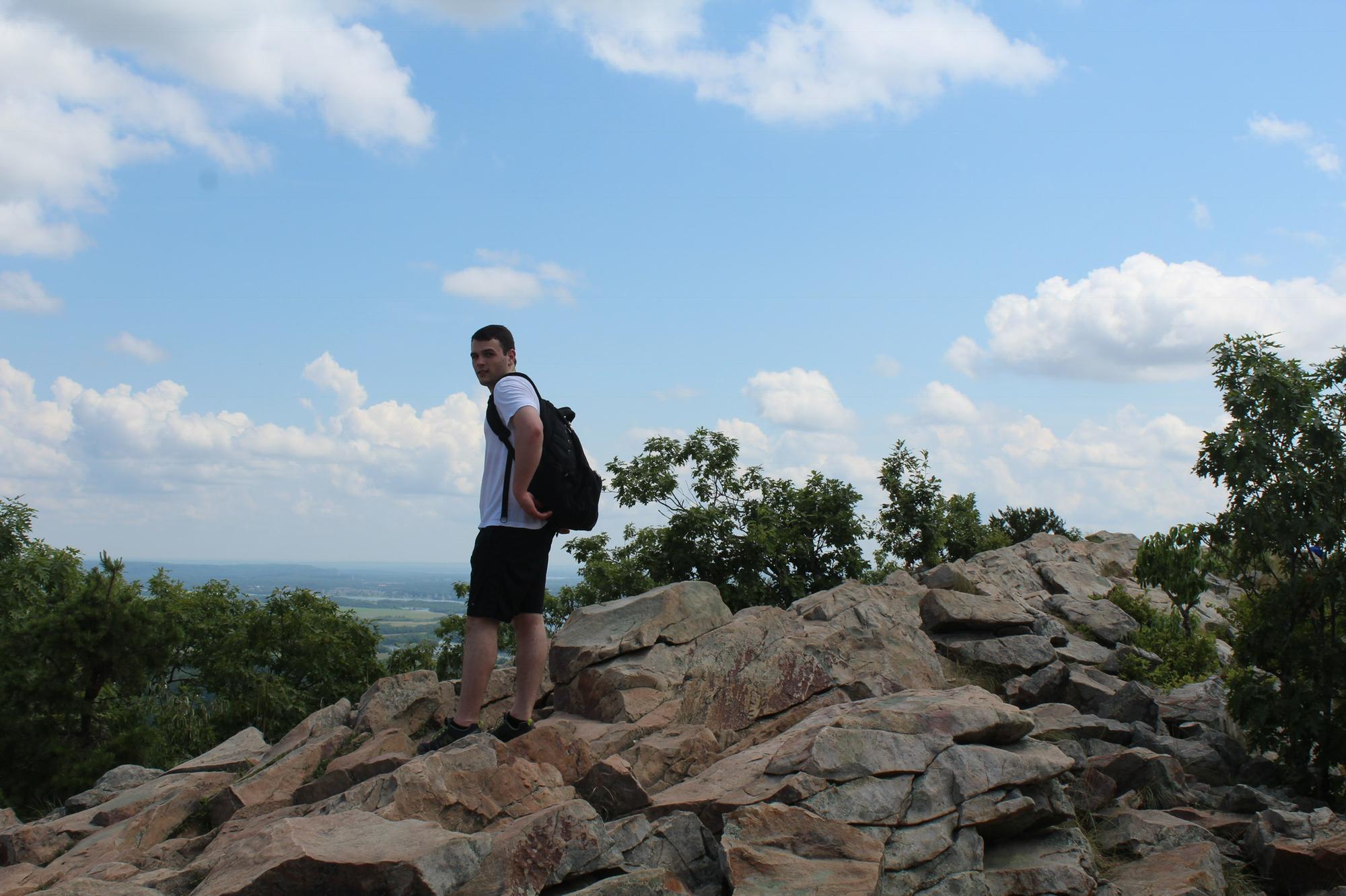 Another picture from the first hike at Pinnacle Mountain; Andrew is standing feet away from where he’d propose to Raleigh just over four years later.