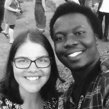 Our first photo together! With Ann and my mom in the background!