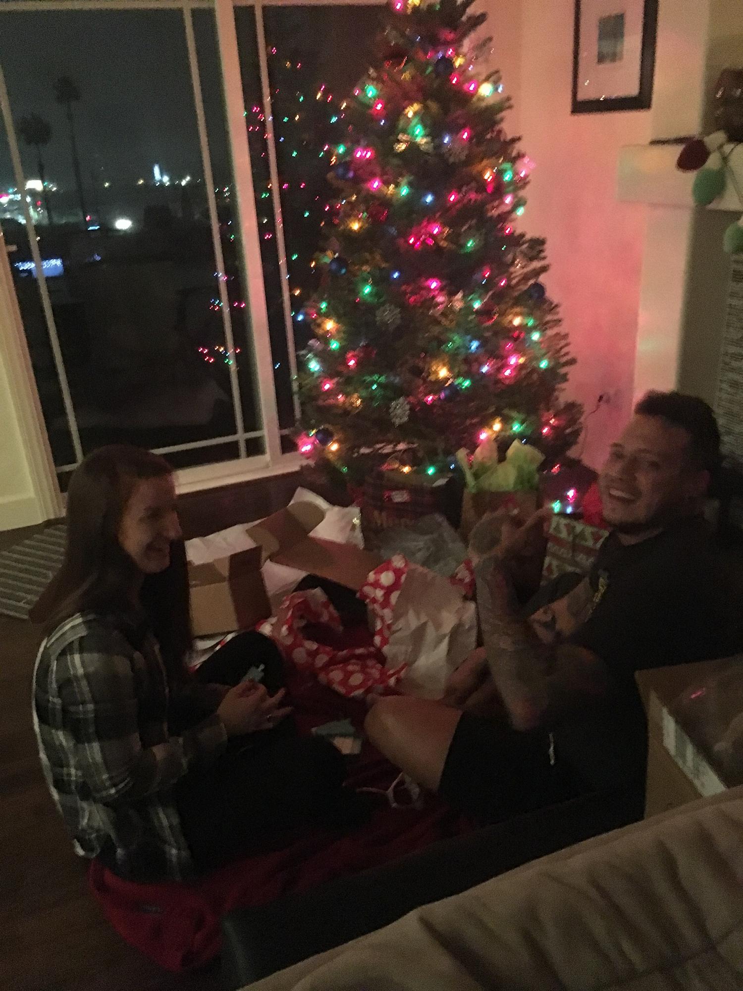 Our first Christmas!  Alex planned to give me my gift that said "I Love You" for the first time but Breanne was there taking pictures so he told me to wait hahaha
