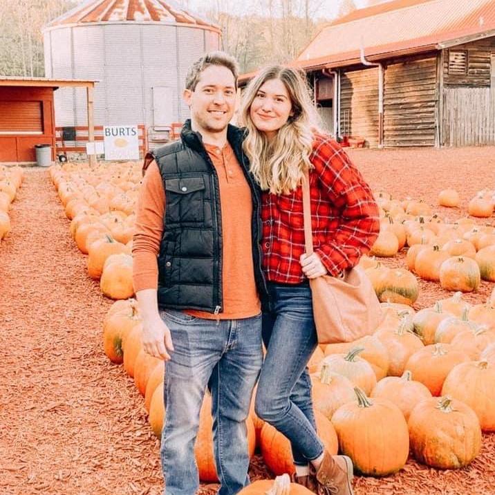 We got a stranger to snap this picture of us on our favorite day trip to the pumpkin patch! Fall is our favorite season!