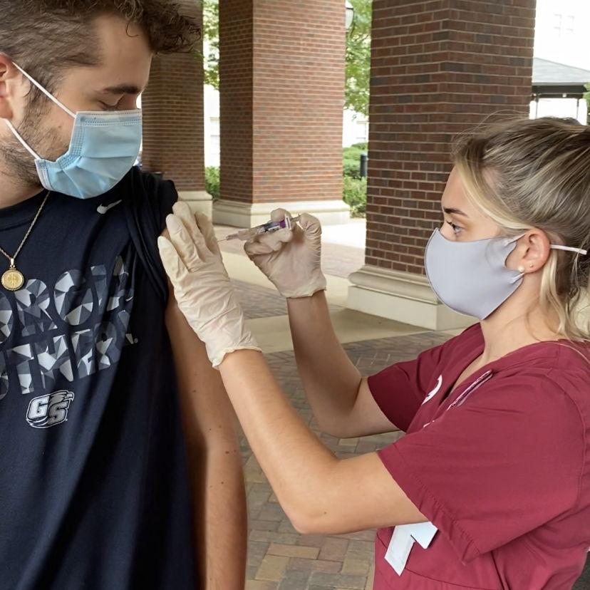 Paul letting Elle learn how to give IM injections on him. What a trooper